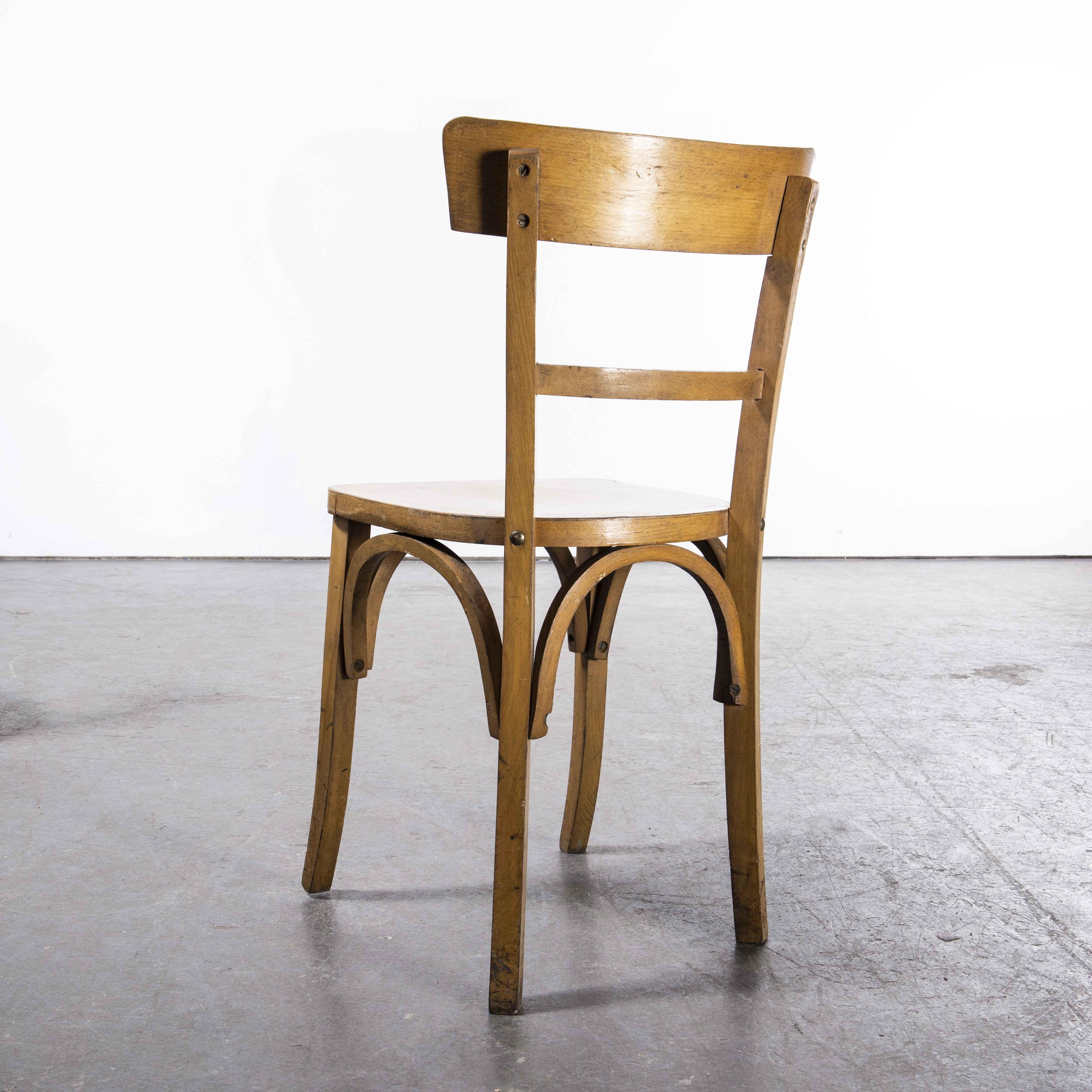 1950’s Baumann bentwood bistro dining chair – single bar back – set of six

1950’s Baumann bentwood bistro dining chair – single bar back – set of six. Classic Beech bistro chair made in France by the maker Baumann. Baumann is a slightly off the