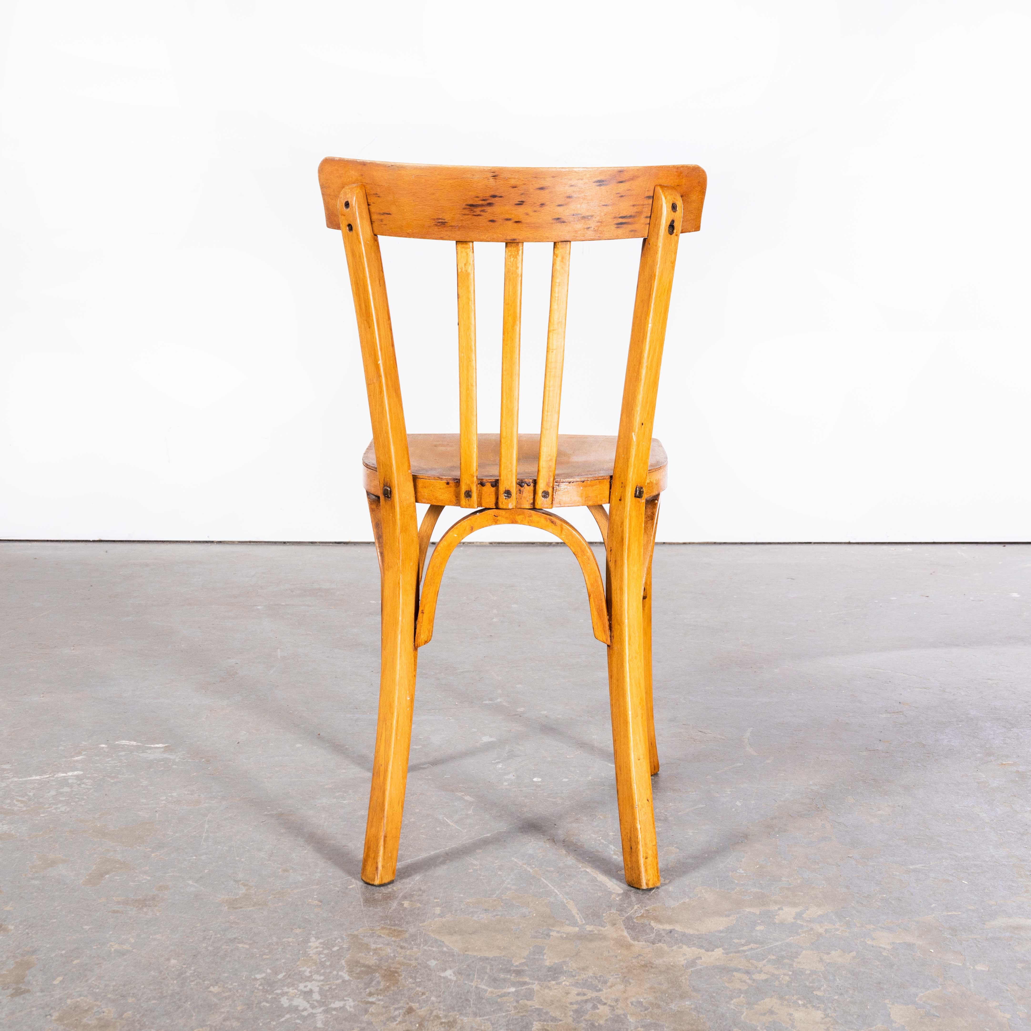 1950s Baumann Honey Tri Back Dining Chair – Set Of Four
1950s Baumann Honey Tri Back Dining Chair – Set Of Four. Classic beech bistro chair made in France by the maker Baumann. Baumann is a slightly off the radar French producer just starting to