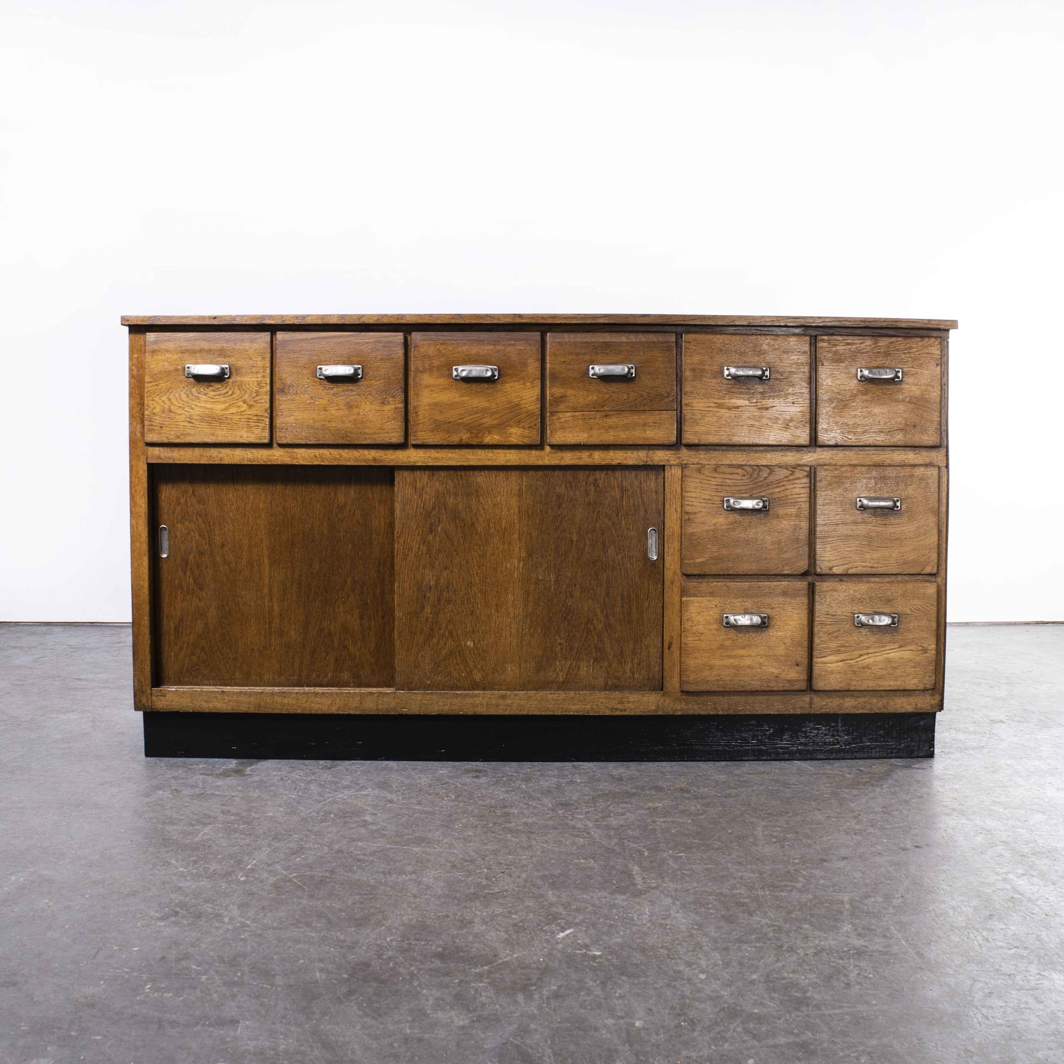 1950's Belgian Oak Apothecary Cabinet with Ten Drawers 8