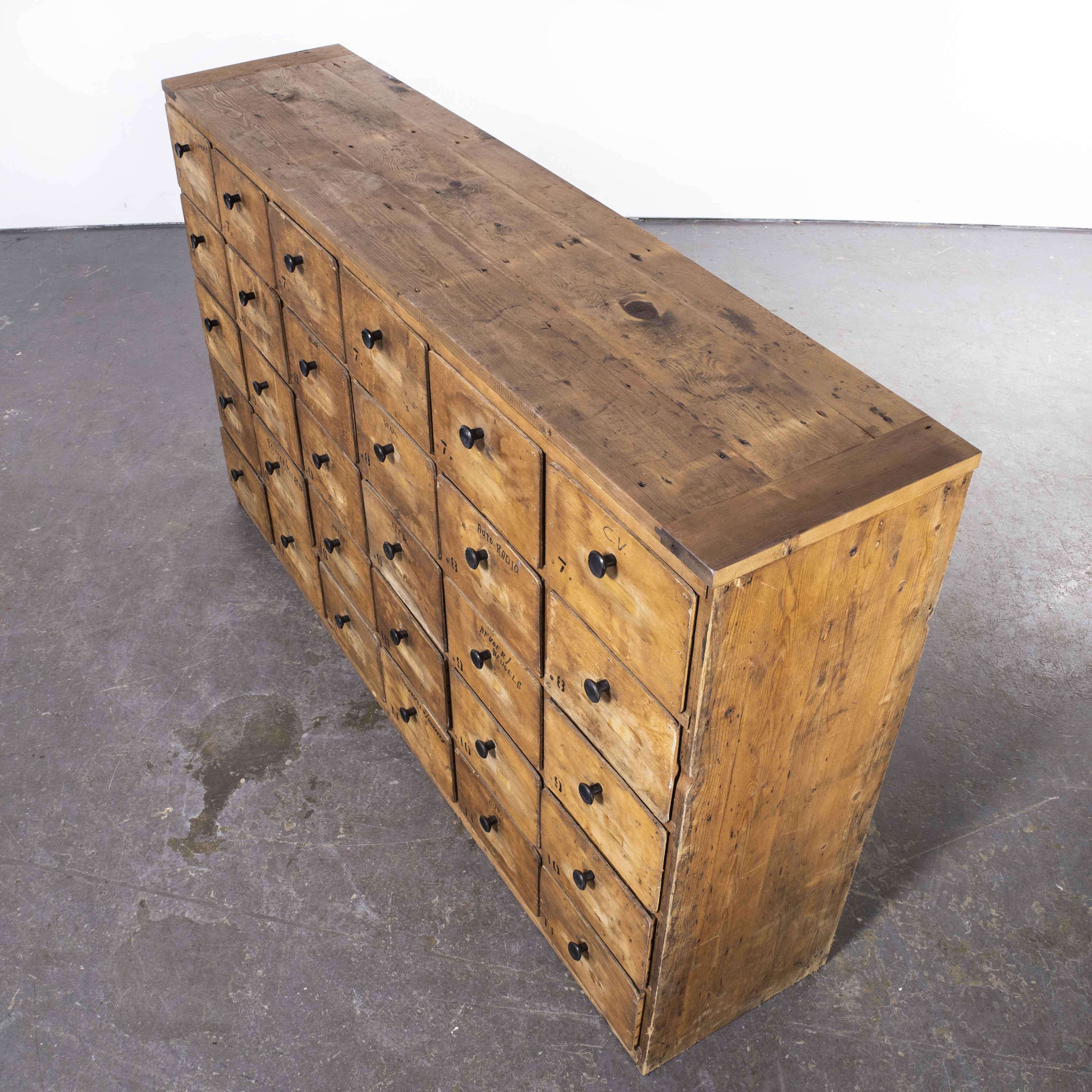 1950?s Belgian workshop bank of drawers ? Thirty drawers

1950?s Belgian workshop bank of drawers ? Thirty drawers. We love this rough and ready bank of workshop drawers from Belgium. Probably handmade by the workshop owner, the drawers have great