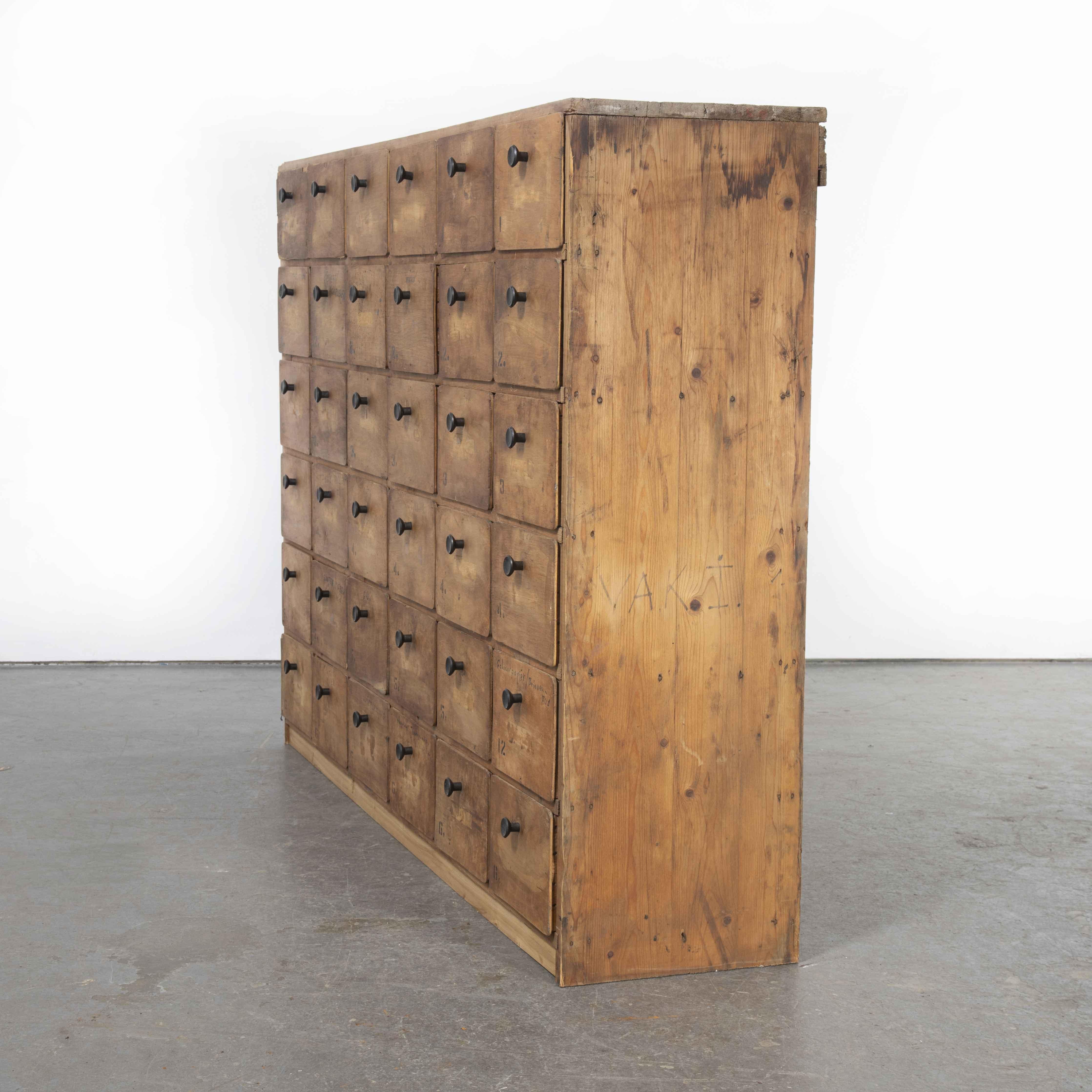 1950’s Belgian workshop bank of drawers – thirty six drawers (Model 1211)

1950’s Belgian workshop bank of drawers – thirty six drawers. We love this rough and ready bank of workshop drawers from Belgium. Probably handmade by the workshop owner,