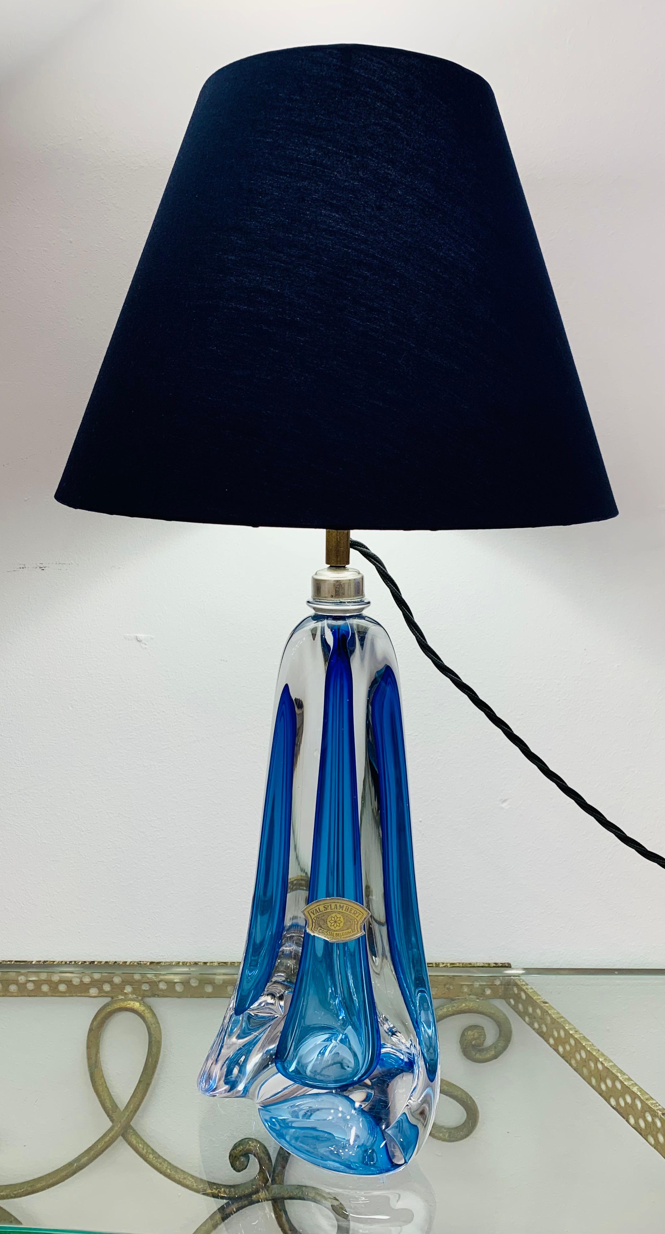1950s Val St Lambert blue and clear crystal glass table lamp base of tapering geometric form with a vintage brass light fitting and black silk flex. Handmade in heavy lead crystal glass in Belgium which makes each one slightly different to the other