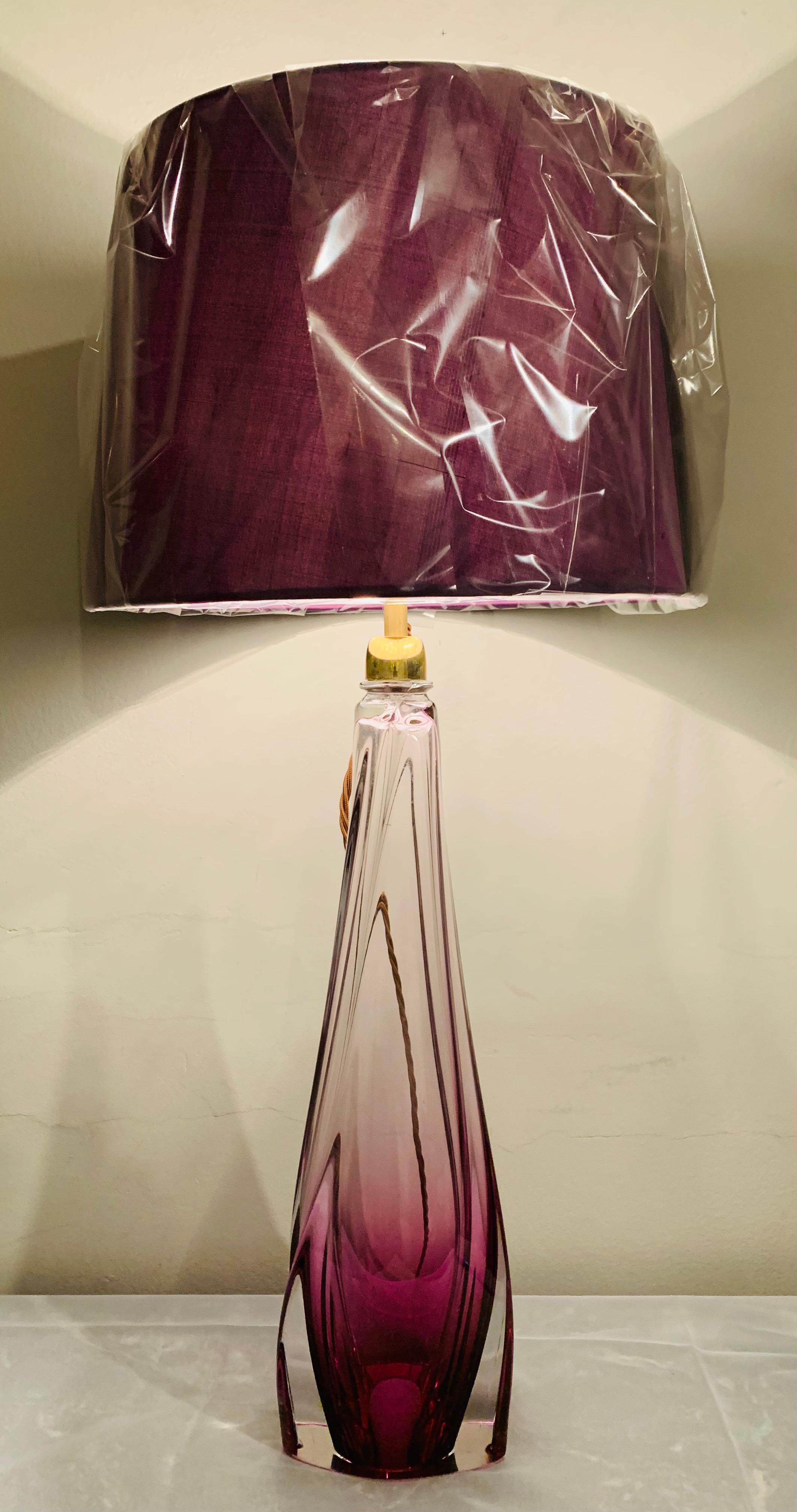 1950s Belgium Val Saint Lambert purple and clear crystal glass table lamp base with a turned tapering form towards the top of the lamp. The lamp is fitted with a polished brass mounted socket with an on/off switch fitted within it which can be