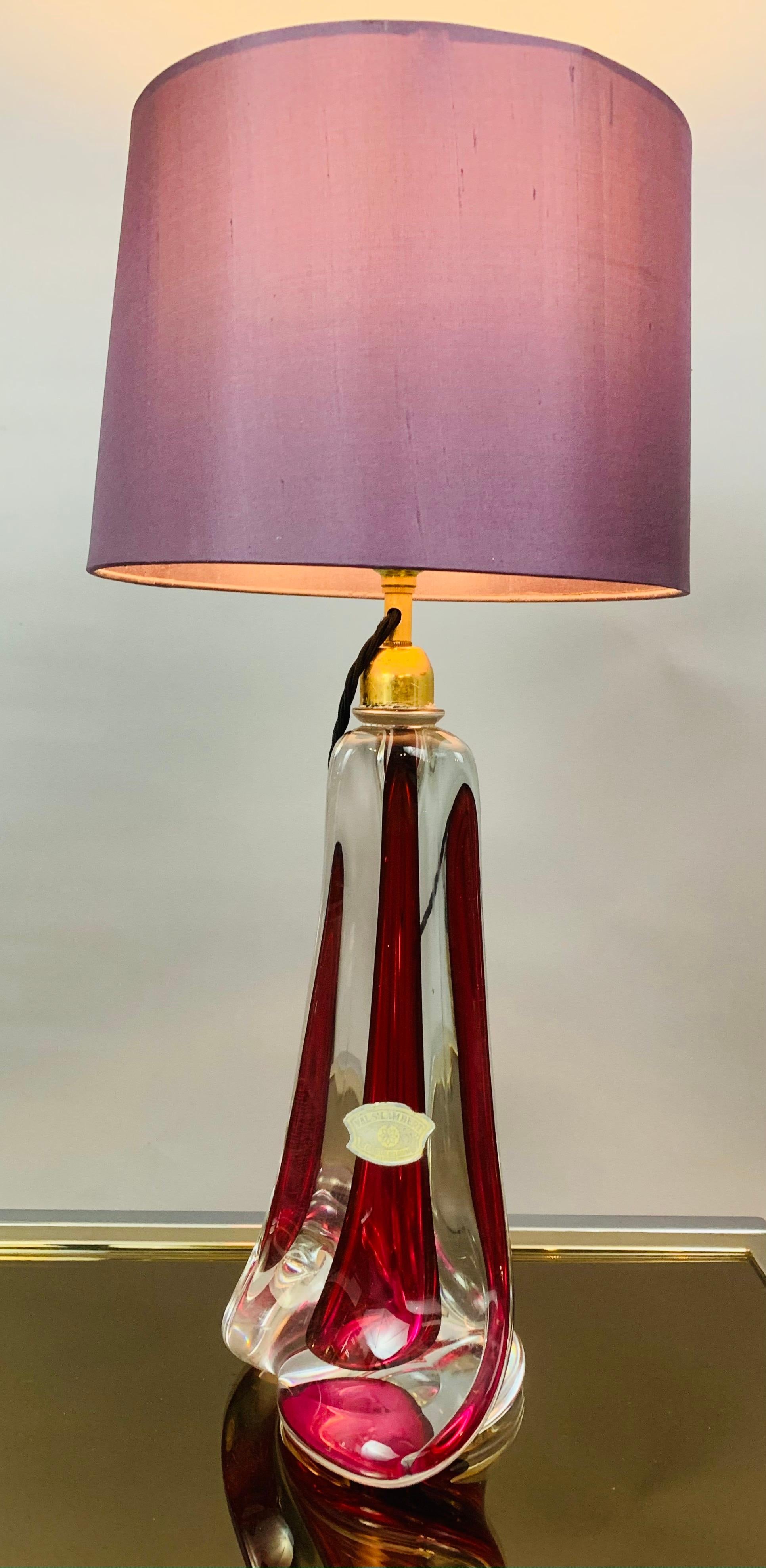 1950s Belgium Val Saint Lambert dark red and clear crystal glass table lamp of tapering geometric form with a brass mounted bayonet bulb socket. Hand Blown in heavy lead crystal glass which makes each one unique and slightly different even if