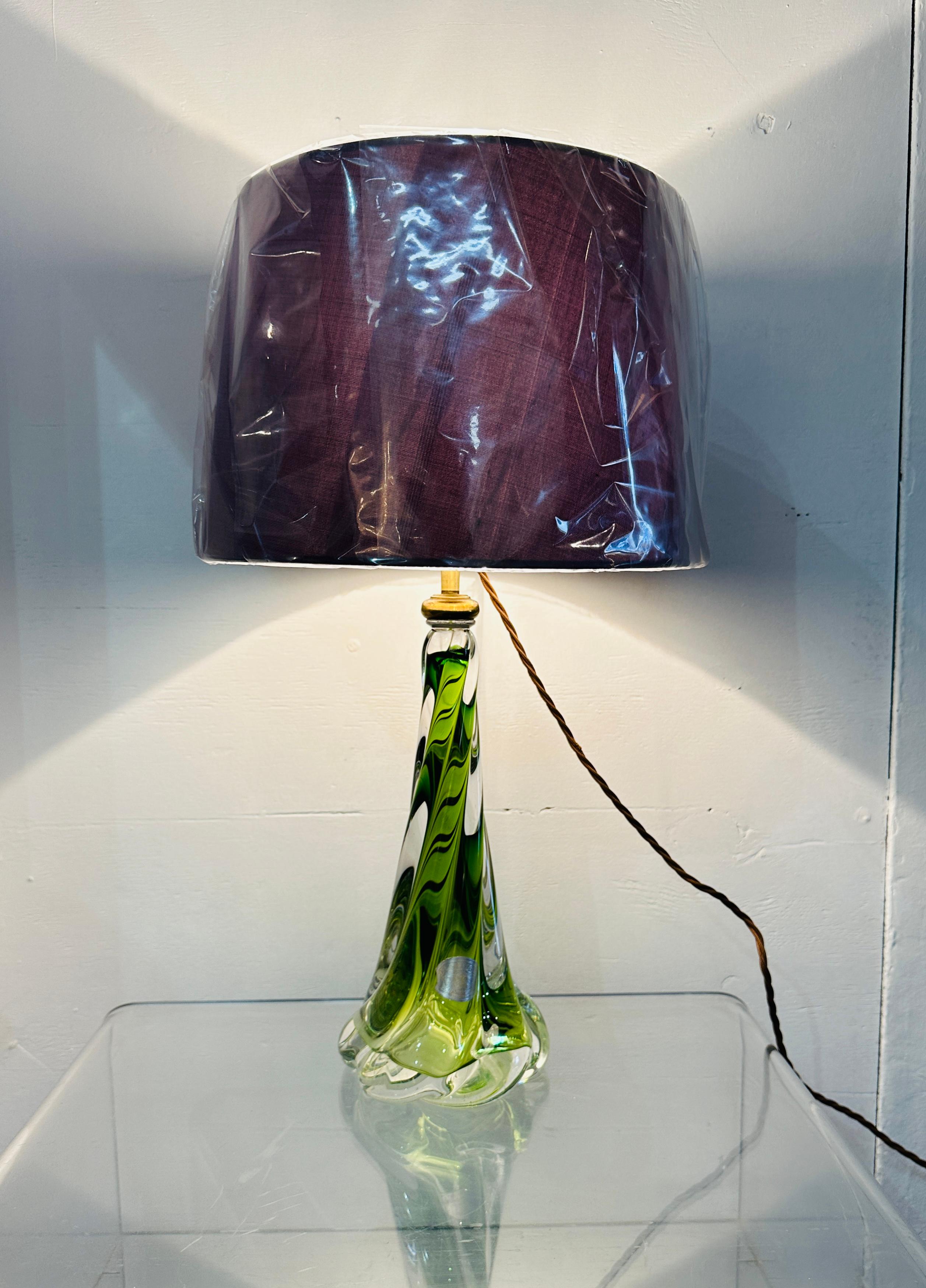 1950s Belgium Val Saint Lambert light green and clear crystal glass twisted lamp base. The lamp base fades from light green encased in clear glass at the top to become clearer fading towards the base. The lamp base has a beautiful flowing swirled