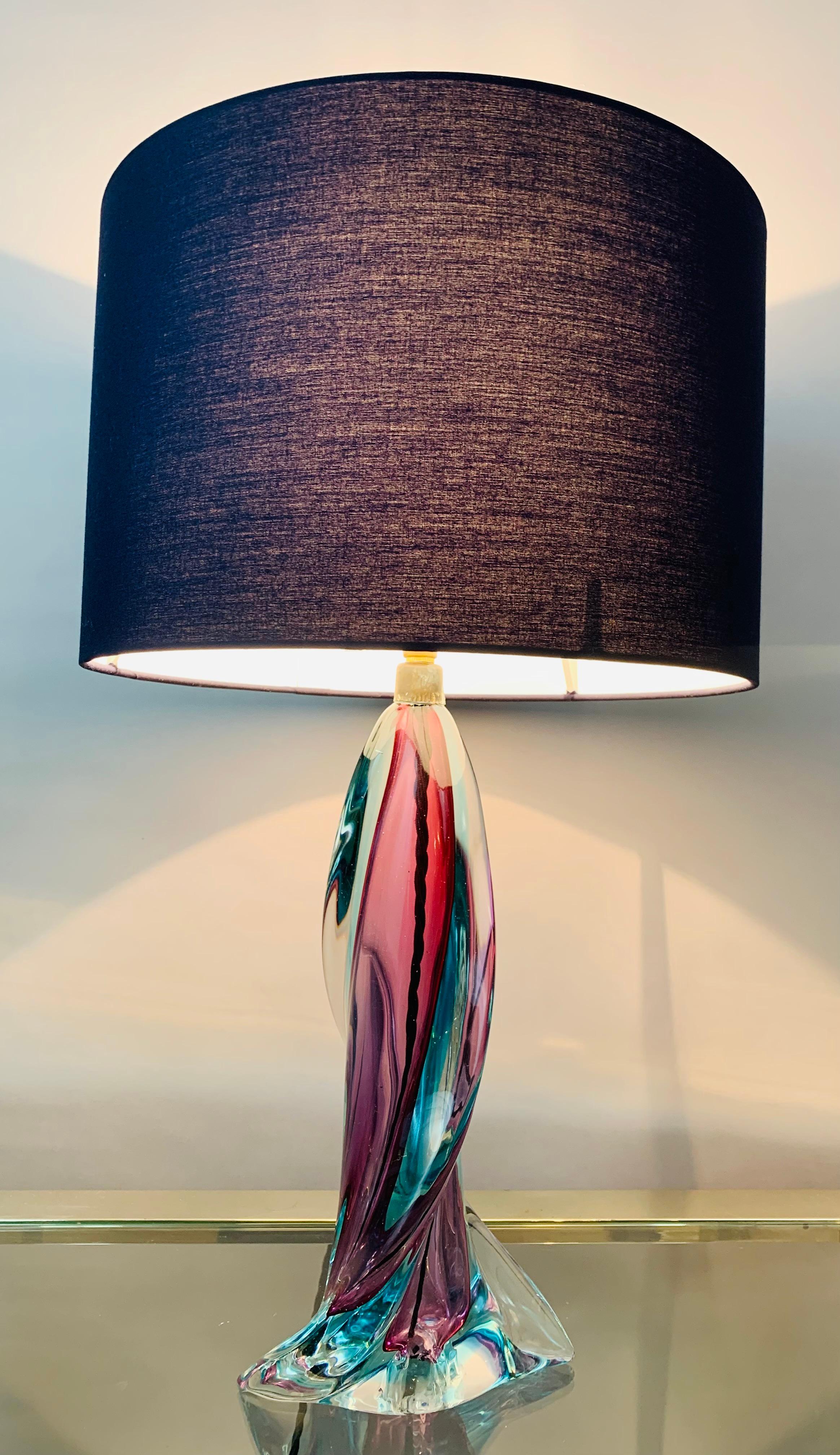 A stunning and colourful 1950s Belgium Val Saint Lambert, turquoise, purple and clear twisted crystal table lamp base. 

The lamp is fitted with a brass mounted bayonet bulb socket. The on/off switch is fitted within the bulb socket and can be