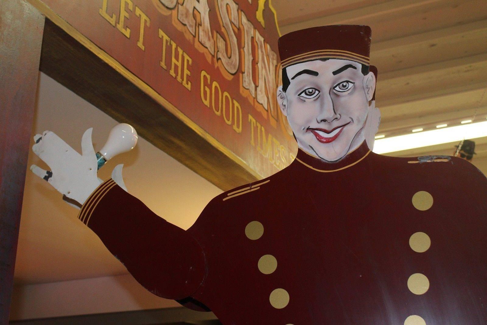 This is a Lighted Bellhop National Animated Sign Co. double-sided that is Manufactured by National Animated Co. These bellhop signs were developed in the late 1940s and patented in 1951 by the National Animated Sign Co. of Hot Springs, AR. These