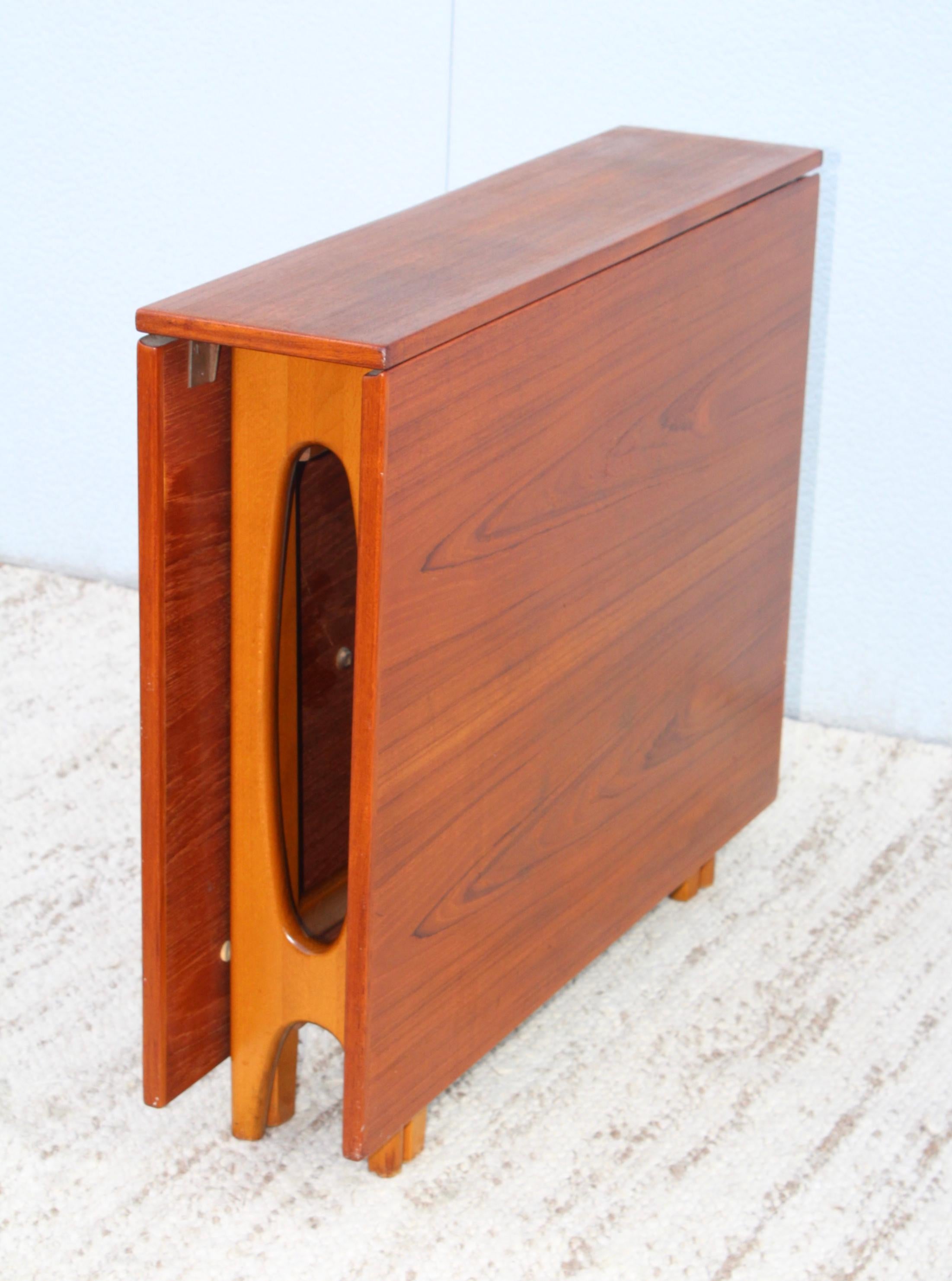 1950s Bendt Winge teak folding drop-leaf dining table.