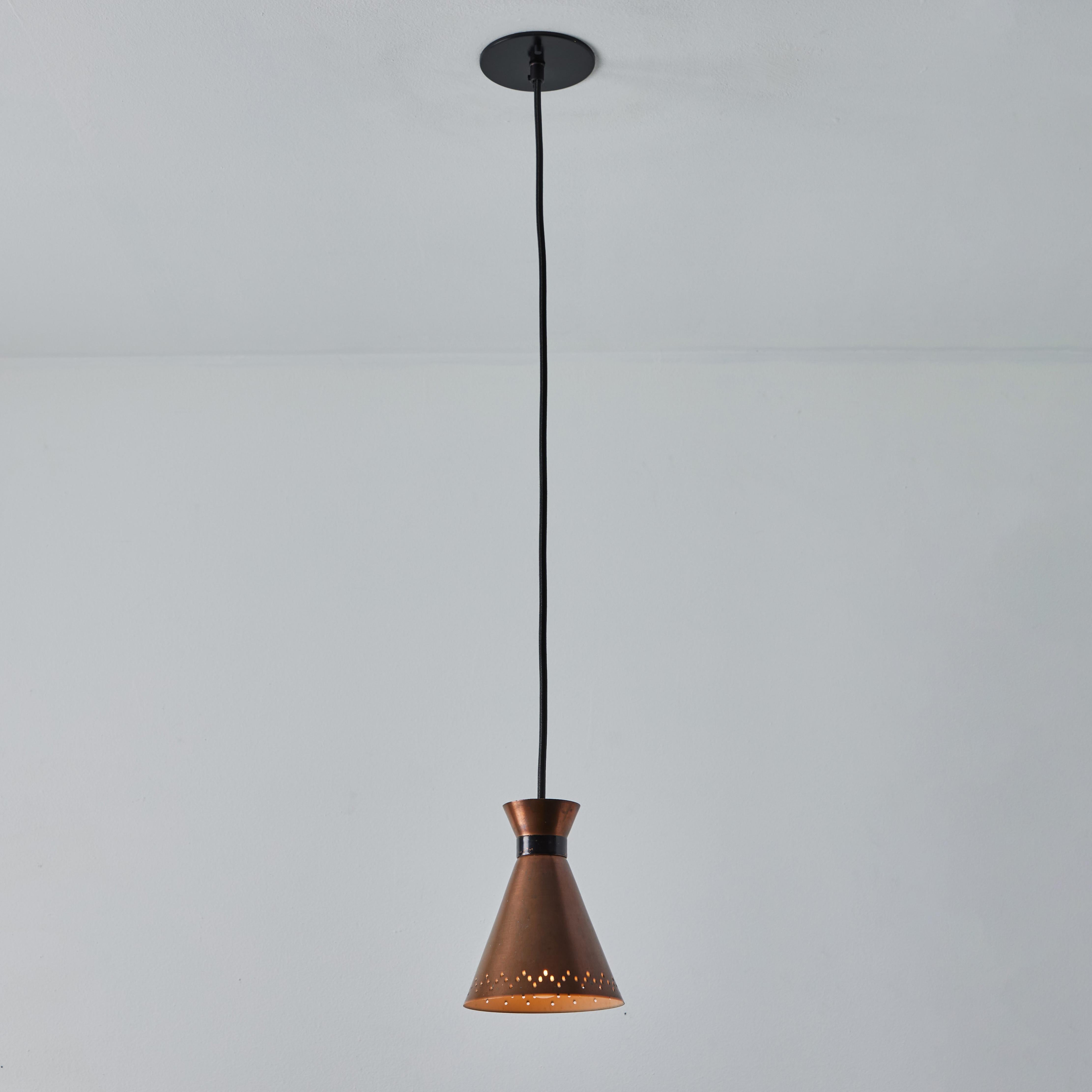 Danish 1950s Bent Karlby Perforated Diabolo Pendant in Copper for Lyfa For Sale