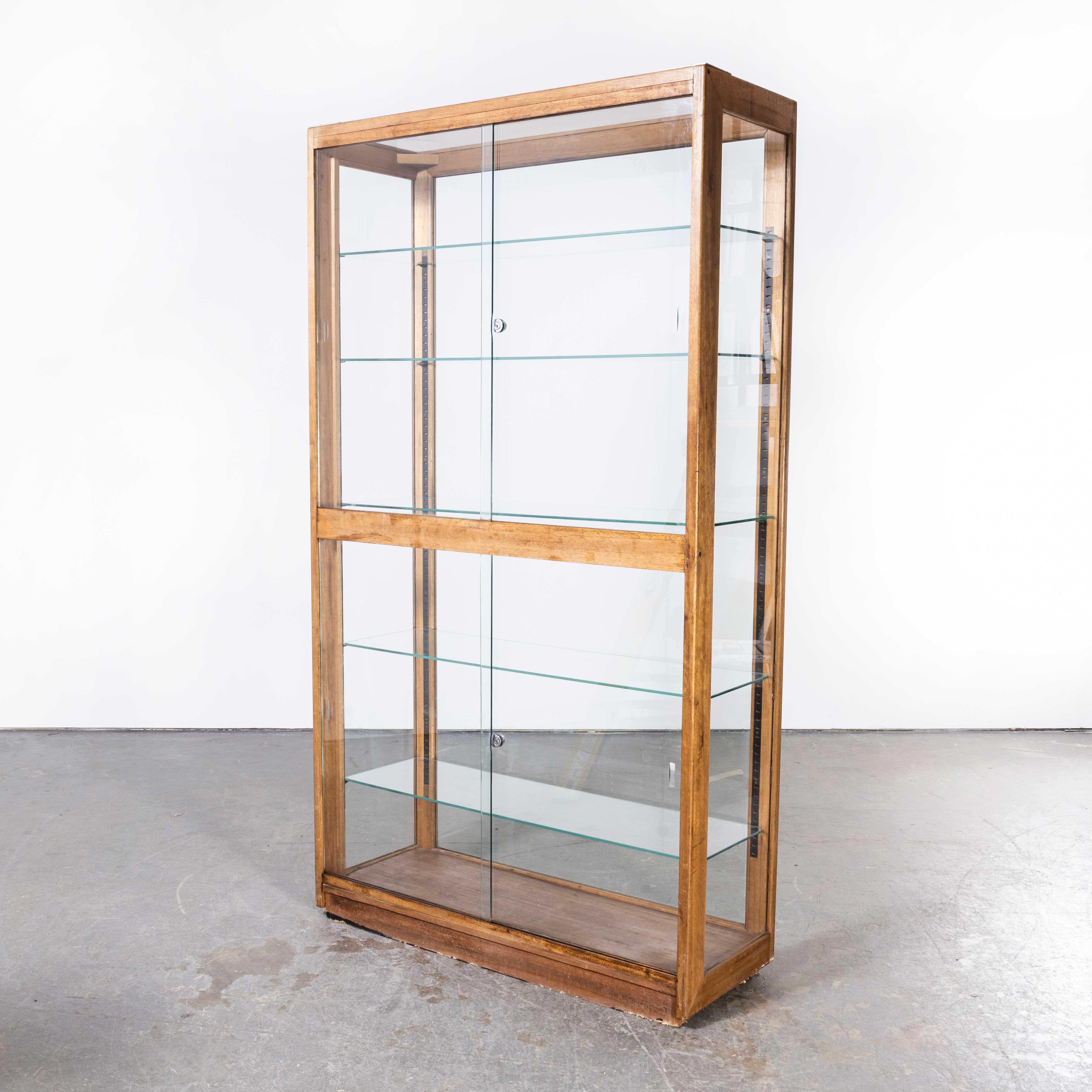 1950’s Birch Glass Shop Display Cabinet – Belgian
1950’s Birch Glass Shop Display Cabinet – Belgian. Sourced in Belgium this large all glass display cabinet came from a pharmacy where it was used on the shop floor. A large solid piece the front
