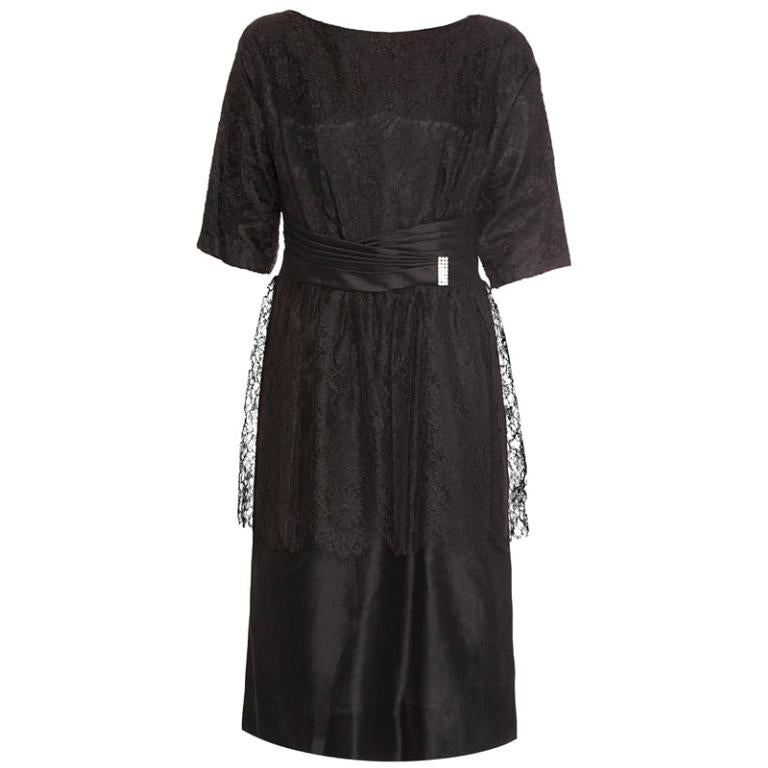 1950s Black Chantilly Lace Peplum Cocktail Dress With Pleated Satin Sash For Sale