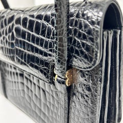 A 1950s High Quality Black Leather Italian Miniature  Hand Bag