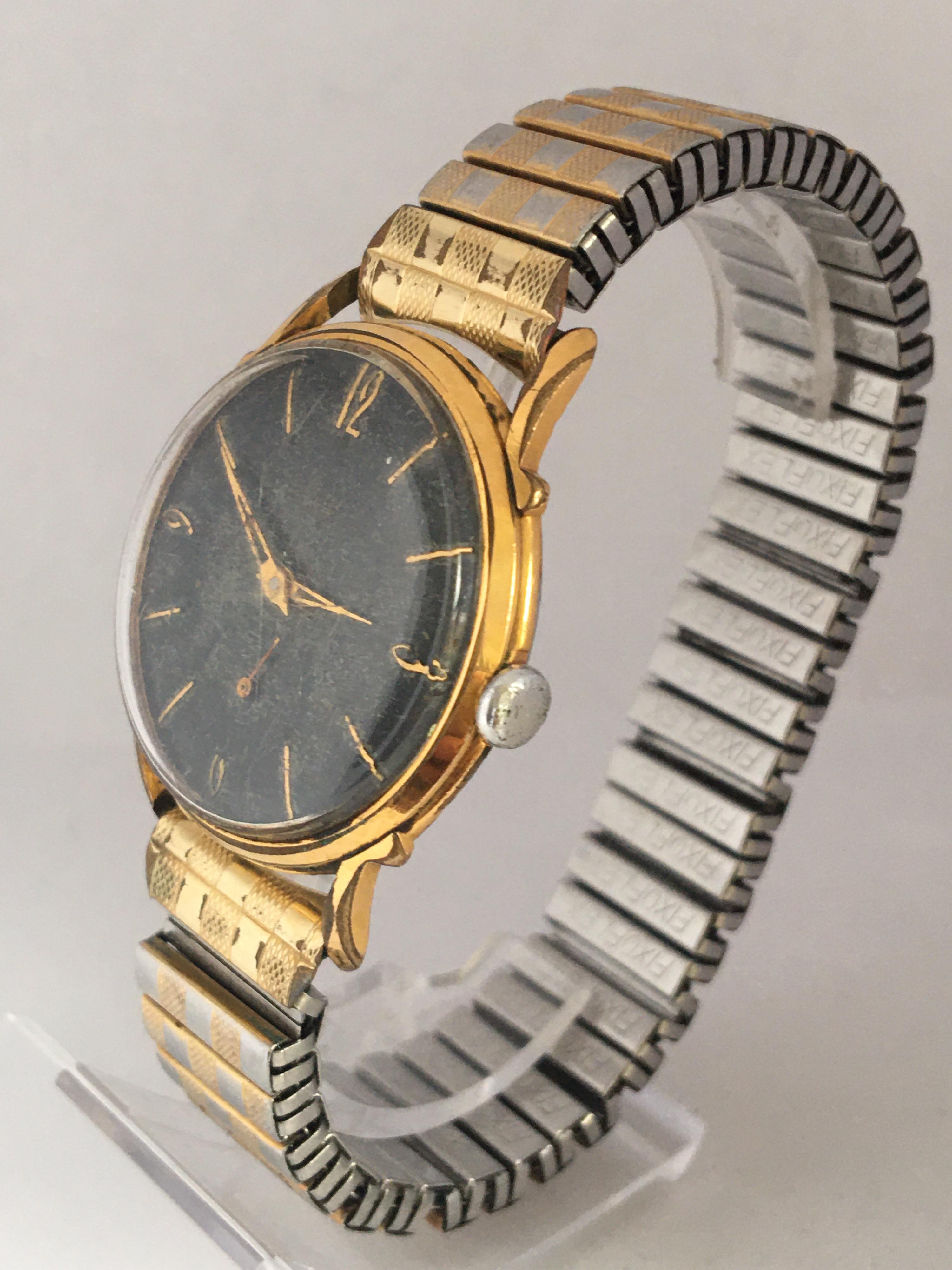 1950s Black Dial Gold-Plated and Stainless Steel Back Swiss Mechanical Watch For Sale 3