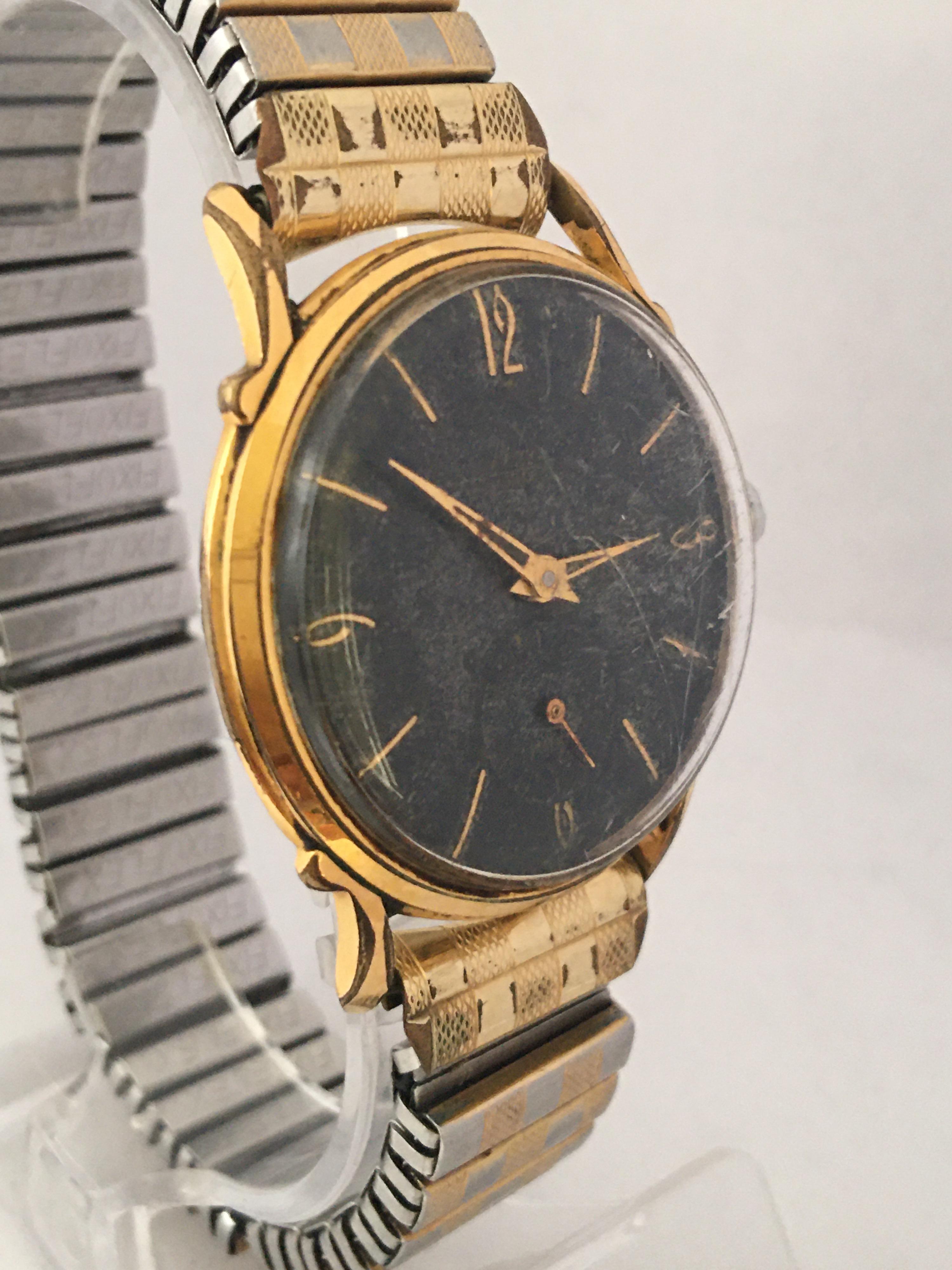 1950s Black Dial Gold-Plated and Stainless Steel Back Swiss Mechanical Watch For Sale 4