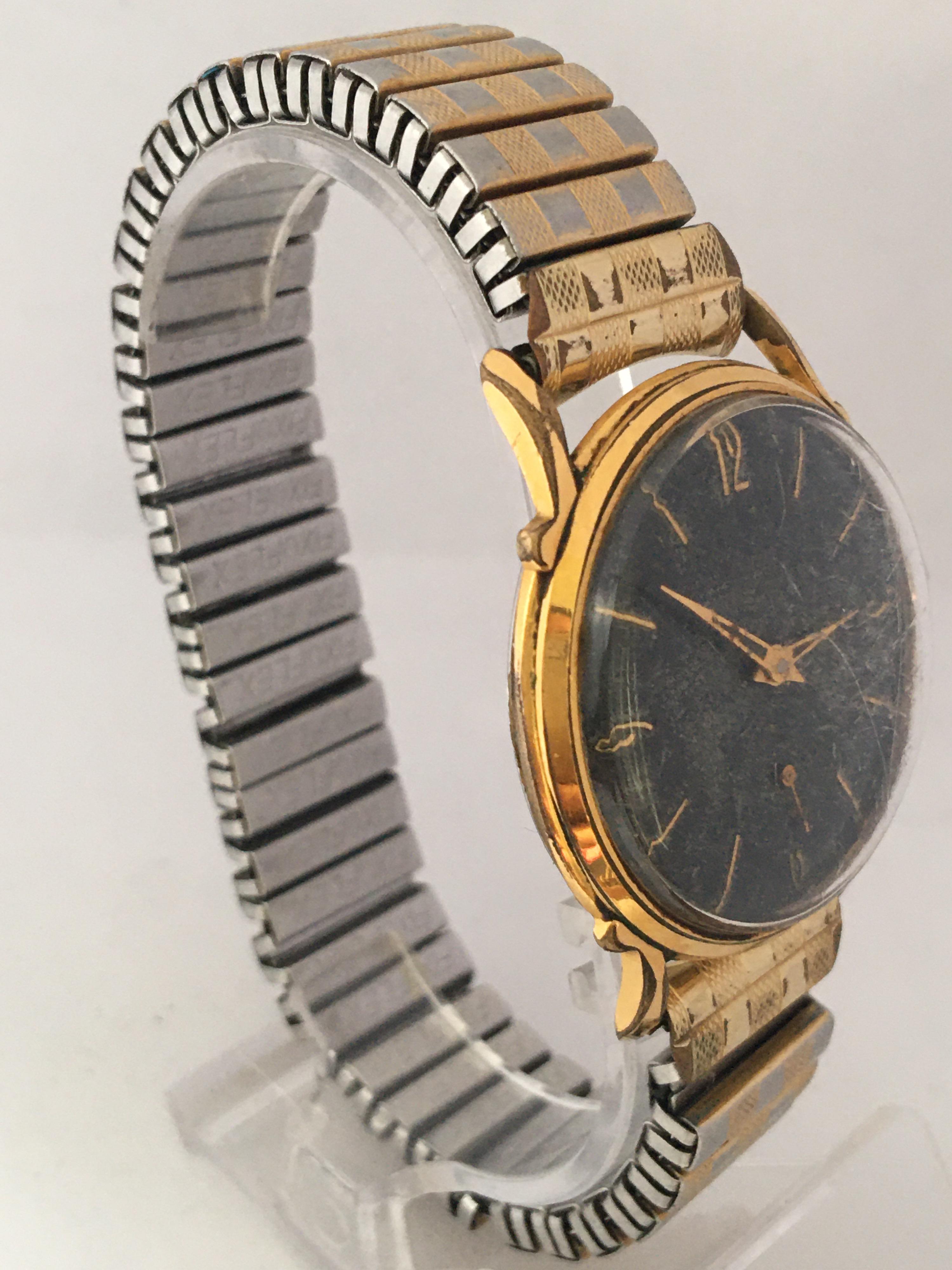 1950s Black Dial Gold-Plated and Stainless Steel Back Swiss Mechanical Watch For Sale 5