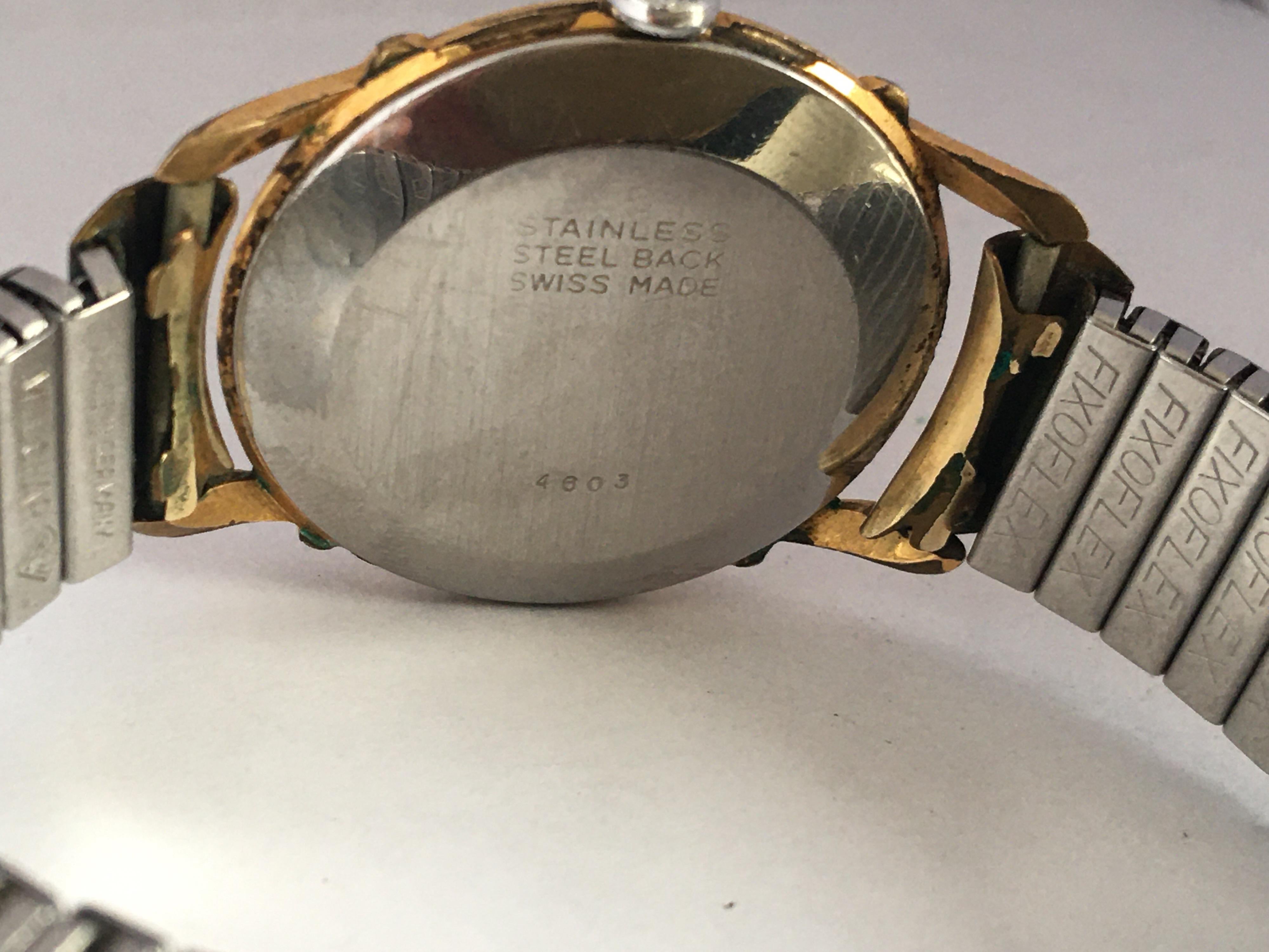 1950s Black Dial Gold-Plated and Stainless Steel Back Swiss Mechanical Watch In Good Condition For Sale In Carlisle, GB