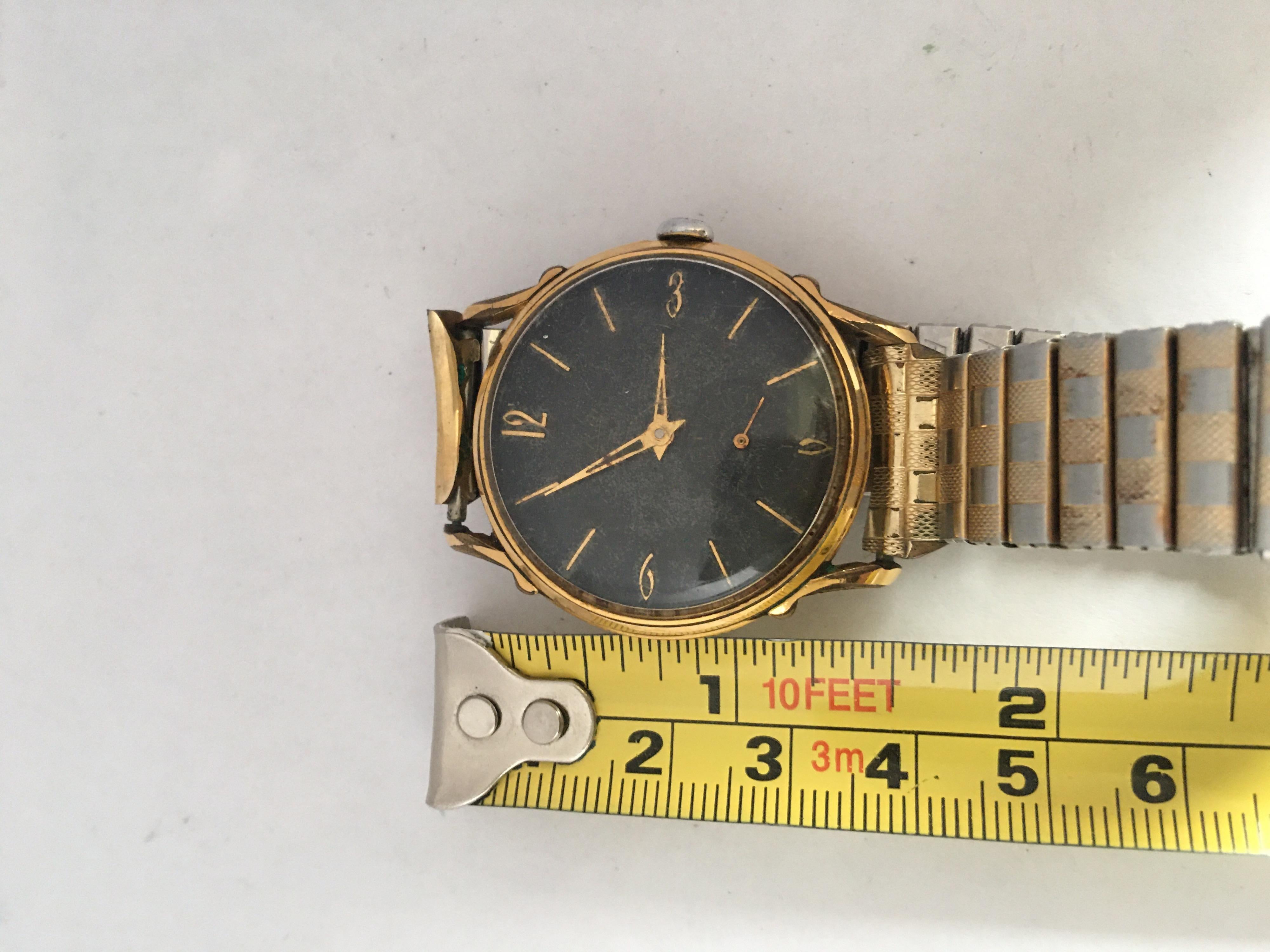 1950s Black Dial Gold-Plated and Stainless Steel Back Swiss Mechanical Watch For Sale 1