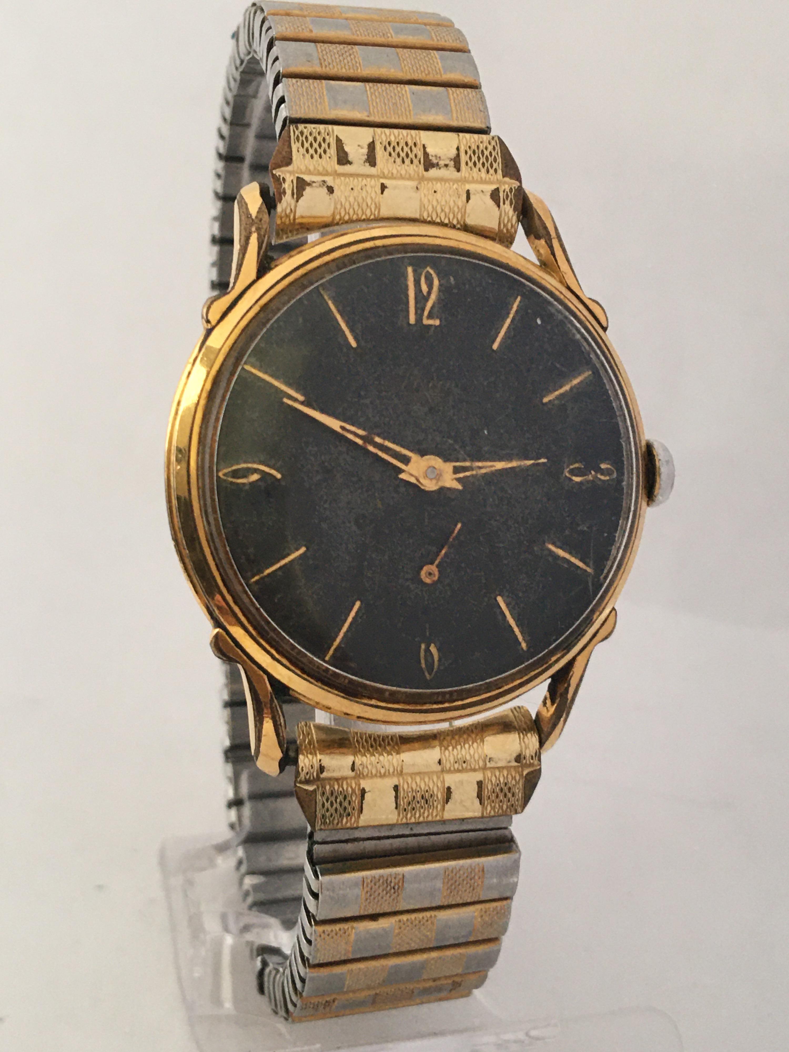 1950s Black Dial Gold-Plated and Stainless Steel Back Swiss Mechanical Watch For Sale 2