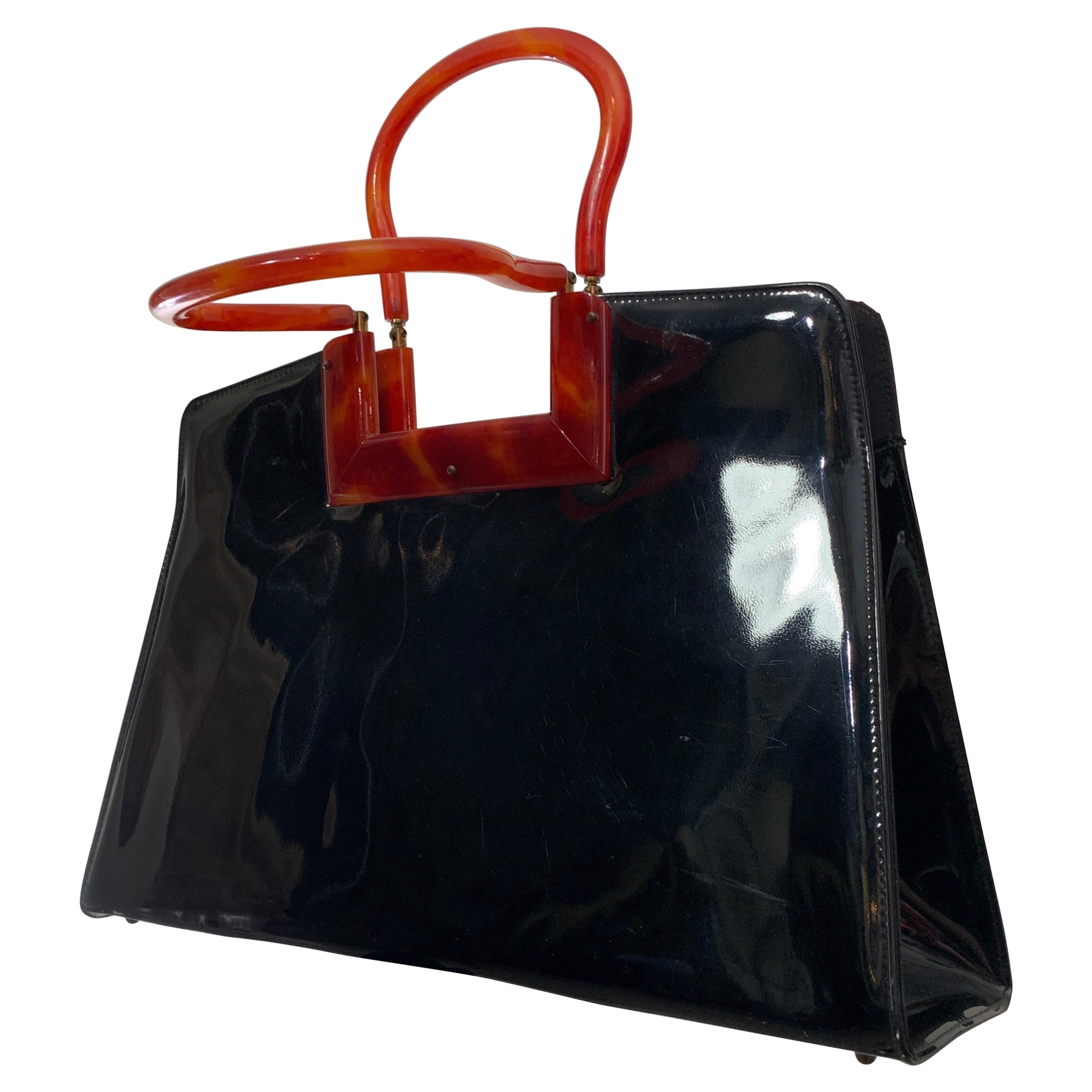1950s Black Glossy Patent Handbag with Faux Tortoise Shell Handles and Frame For Sale