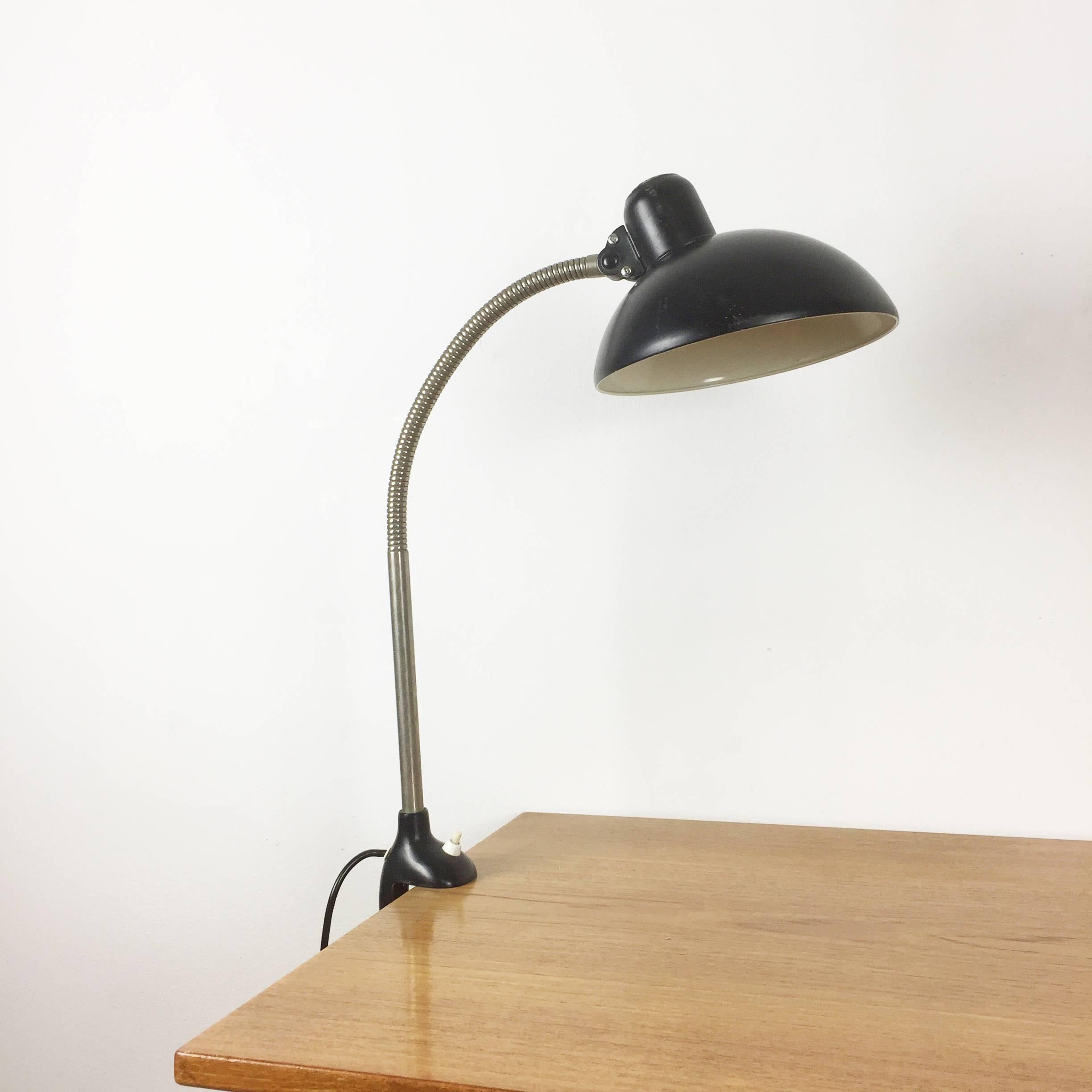 Article:

Desk light for table fixation model 6740


Producer:

Kaiser Idell, Germany


Design:

Christian Dell (Bauhaus)


Age:

1950s


Description:

Original 1960s Kaiser Idell Bauhaus Light, designed by Christian Dell in