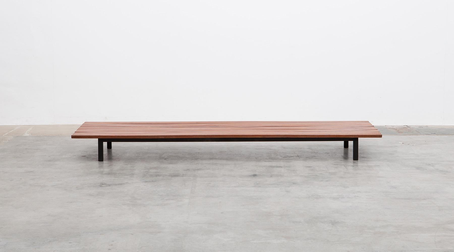 Simple yet originally inventive Perriand bench. Sold and distributed in the 1950s by famous Paris gallery Steph Simon, together with pieces by her frequent collaborator Jean Prouvé.

Charlotte Perriand is one of the most influential French designers