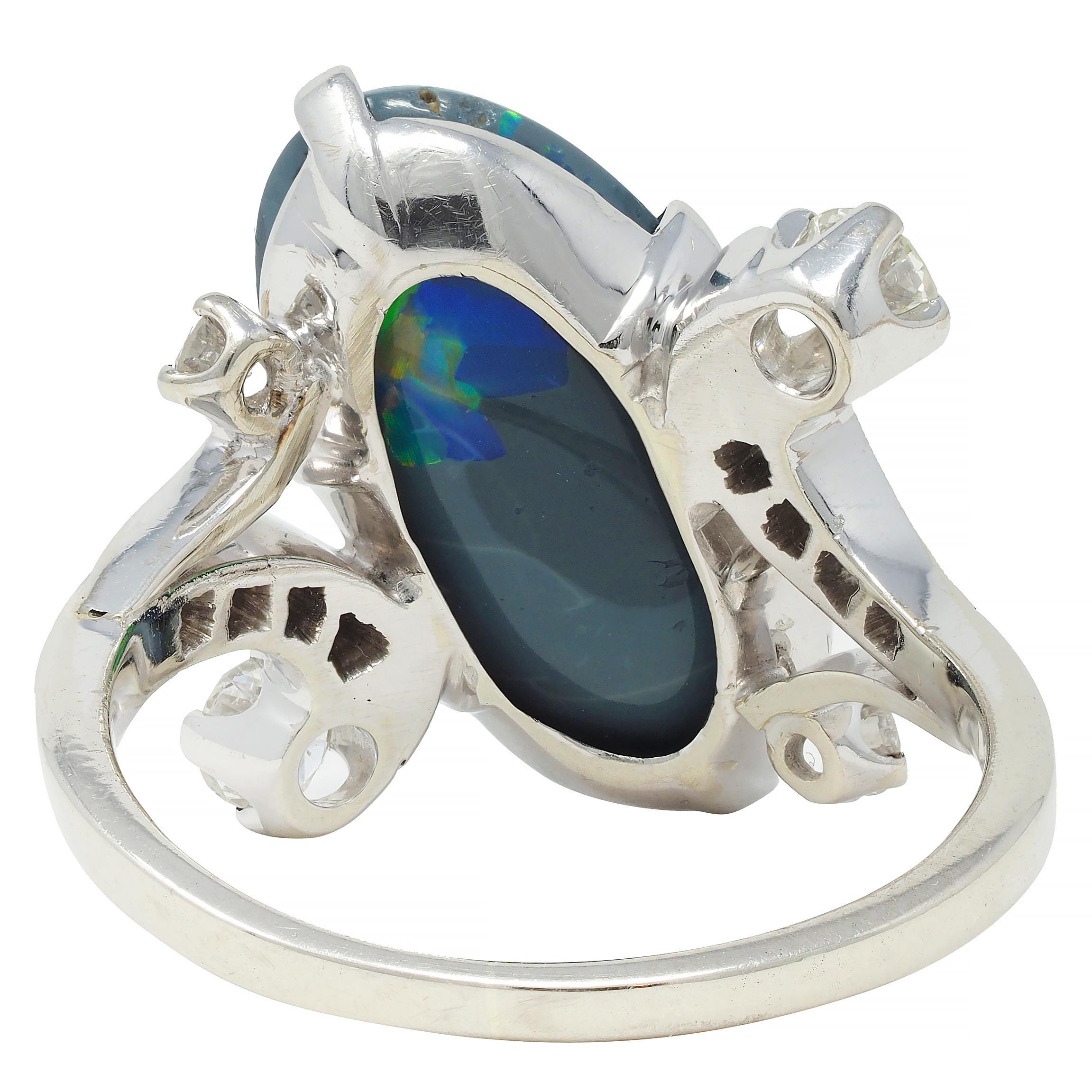 Women's or Men's 1950's Black Opal Diamond 14 Karat White Gold Scrolling Navette Bypass Ring For Sale
