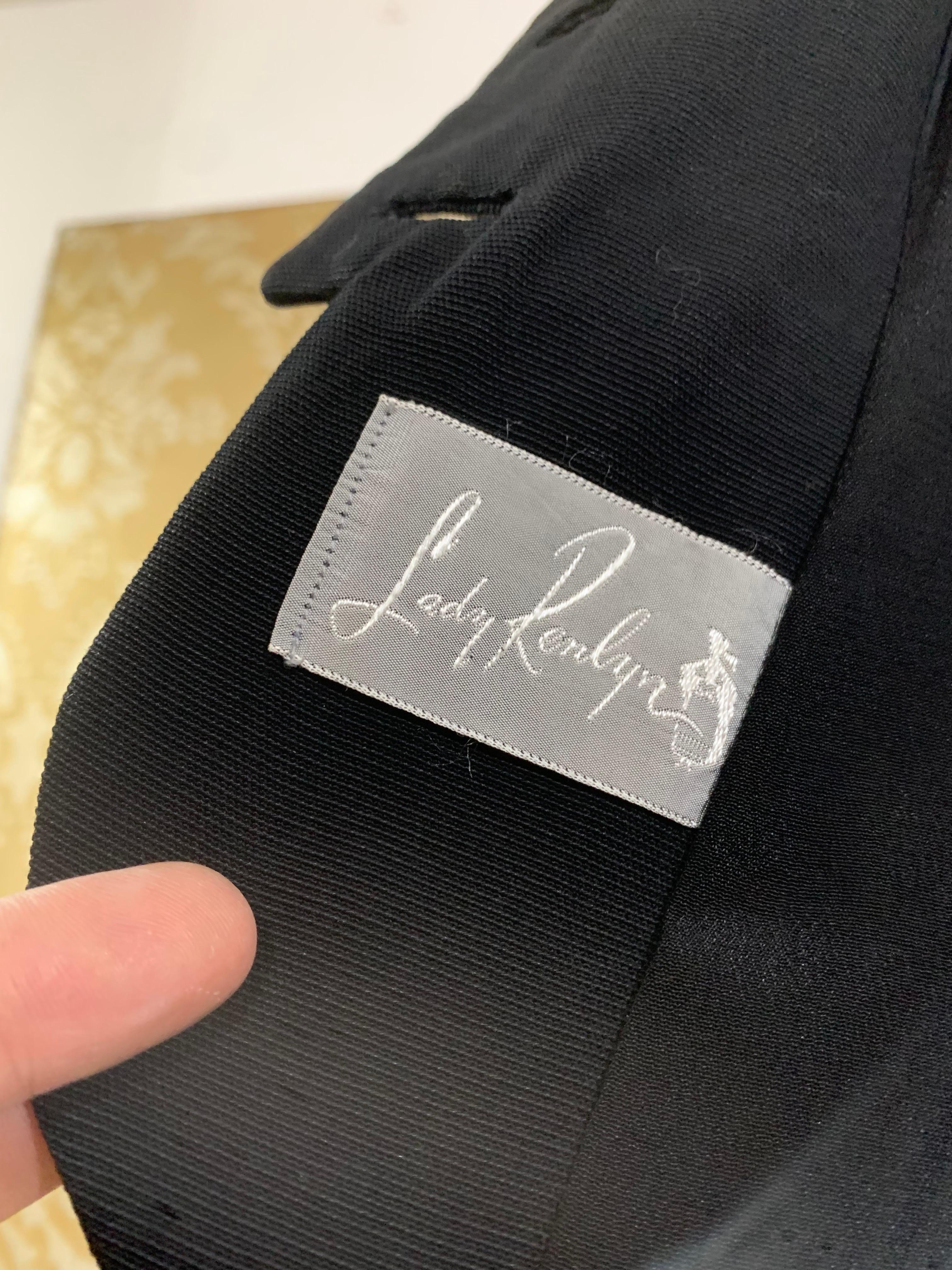 Abito con gonna aderente in gabardine di lana nera a doppio peplo degli anni '50 in vendita 7