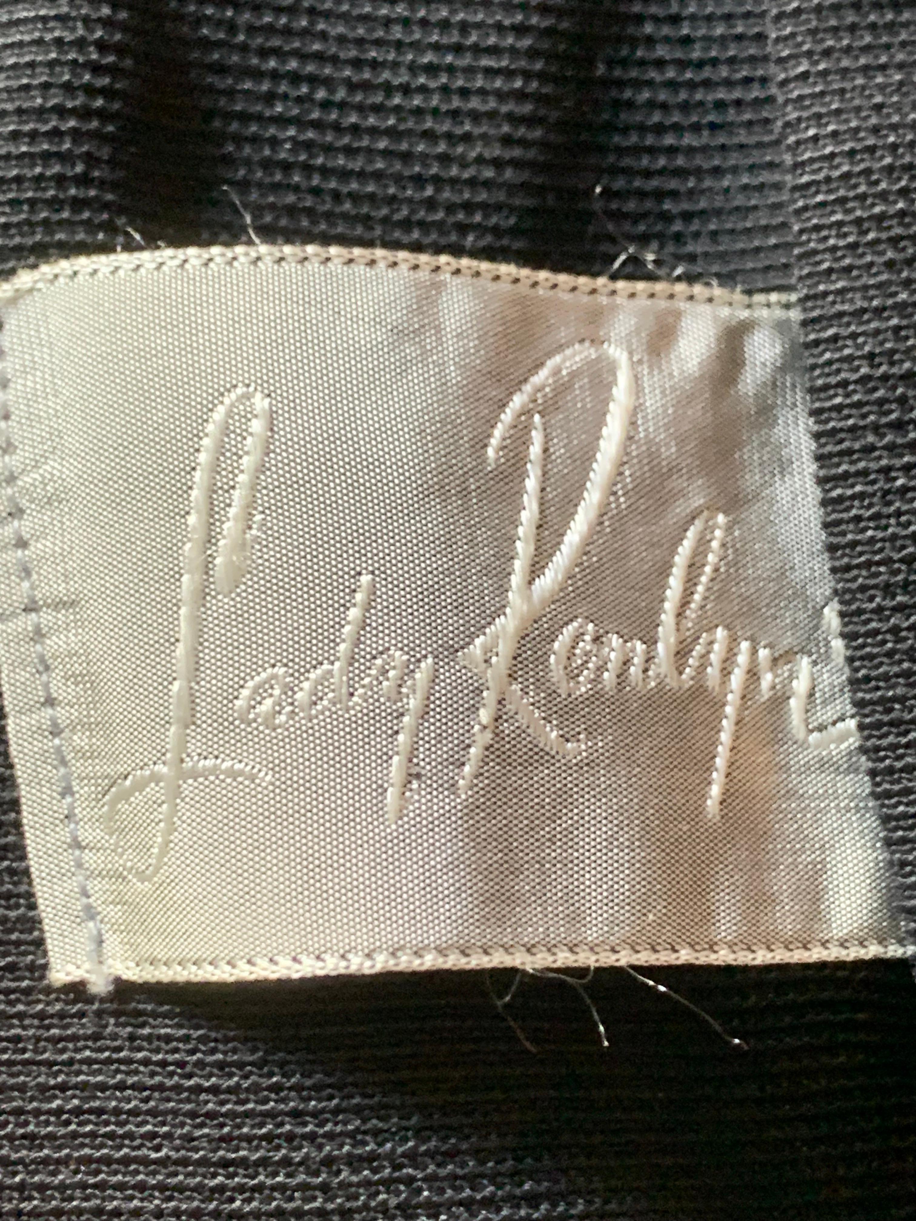 Abito con gonna aderente in gabardine di lana nera a doppio peplo degli anni '50 in vendita 12