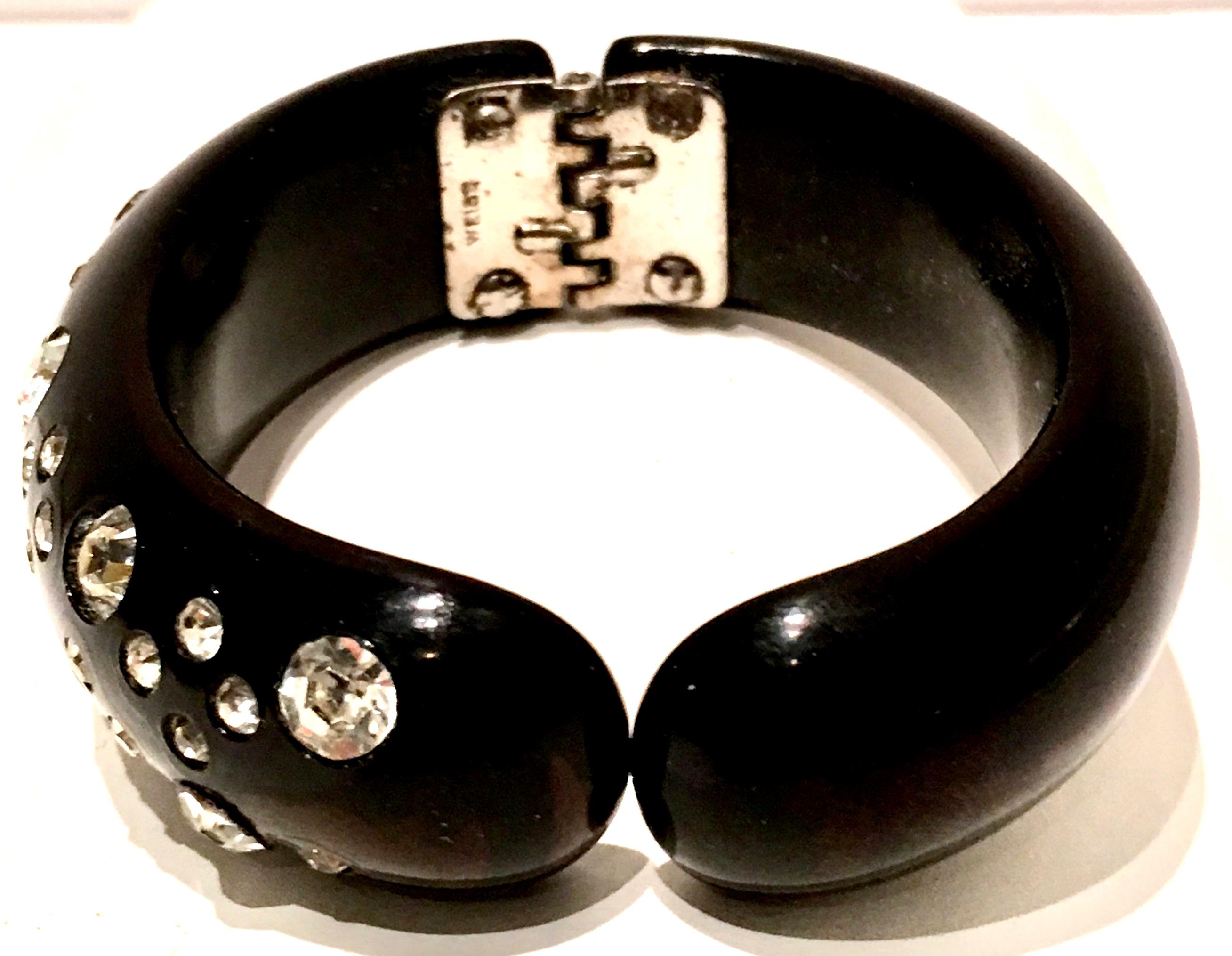 1950'S Coveted Black & Crystal Clear Swarovski Rhinestone, Signed Clamper Cuff Bracelet By, Weiss.. This piece is signed on the silver chrome metal hinge interior, Weiss.
Internal diameter measures, 2