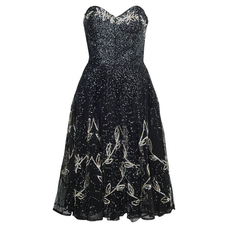 black dress with silver flower David Koma Flower front Mini Dress in Black & Silver