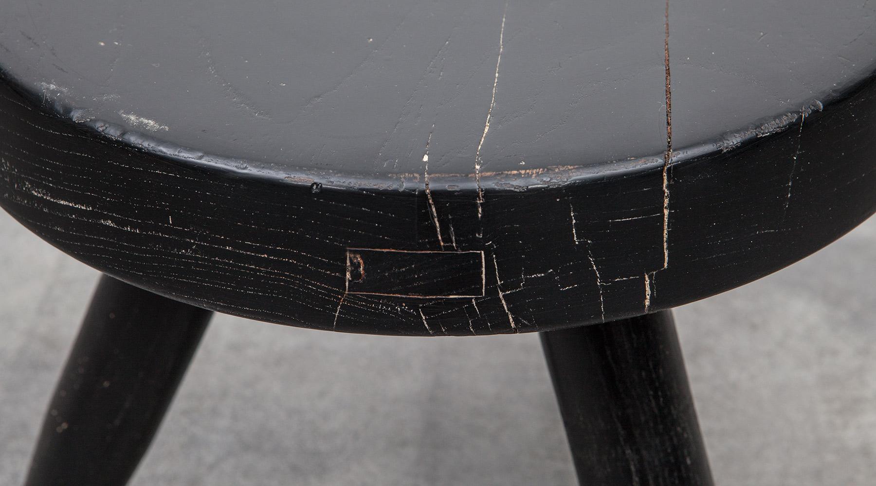 black wooden stool