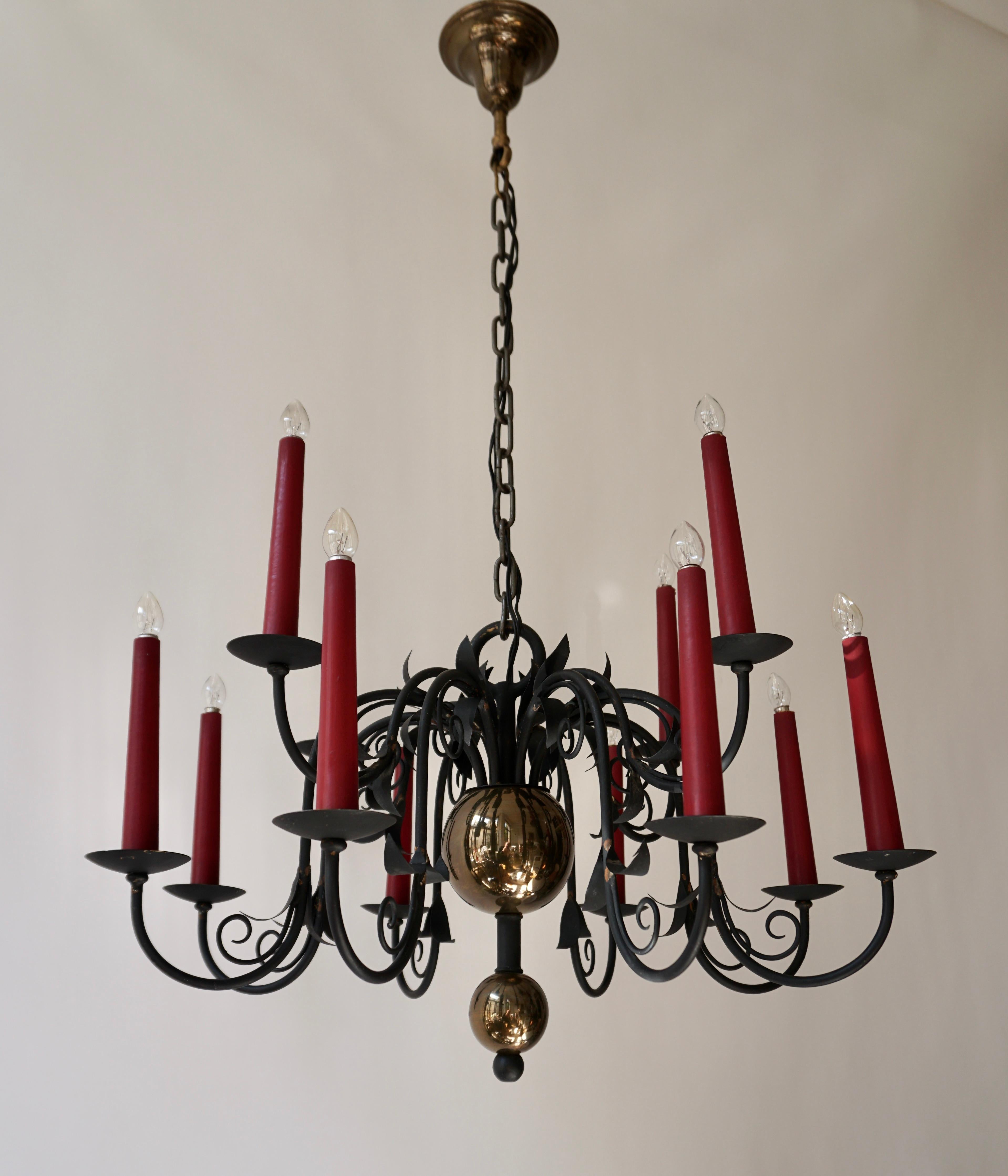 20th Century 1950s Black Wrought Iron Gothic Chandelier with 12 Red Candlesticks
