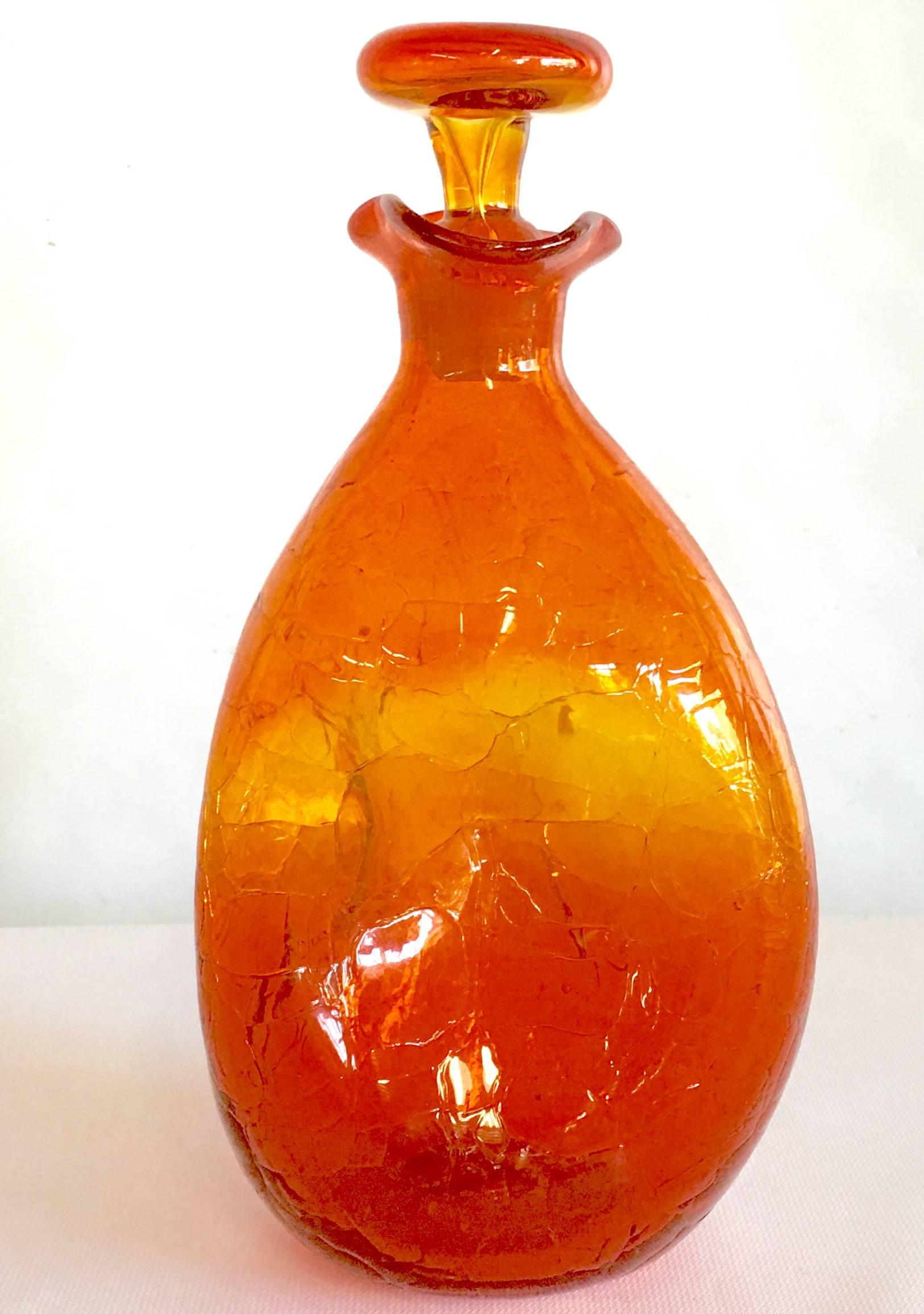 Mid-Century Modern Blenko hand blown glass Amberina tangerine pinched crackle glass decanter with stopper. Makers Pontil mark appears on underside. Ruffle neck detail. Rare and hard to find Blenko glass 