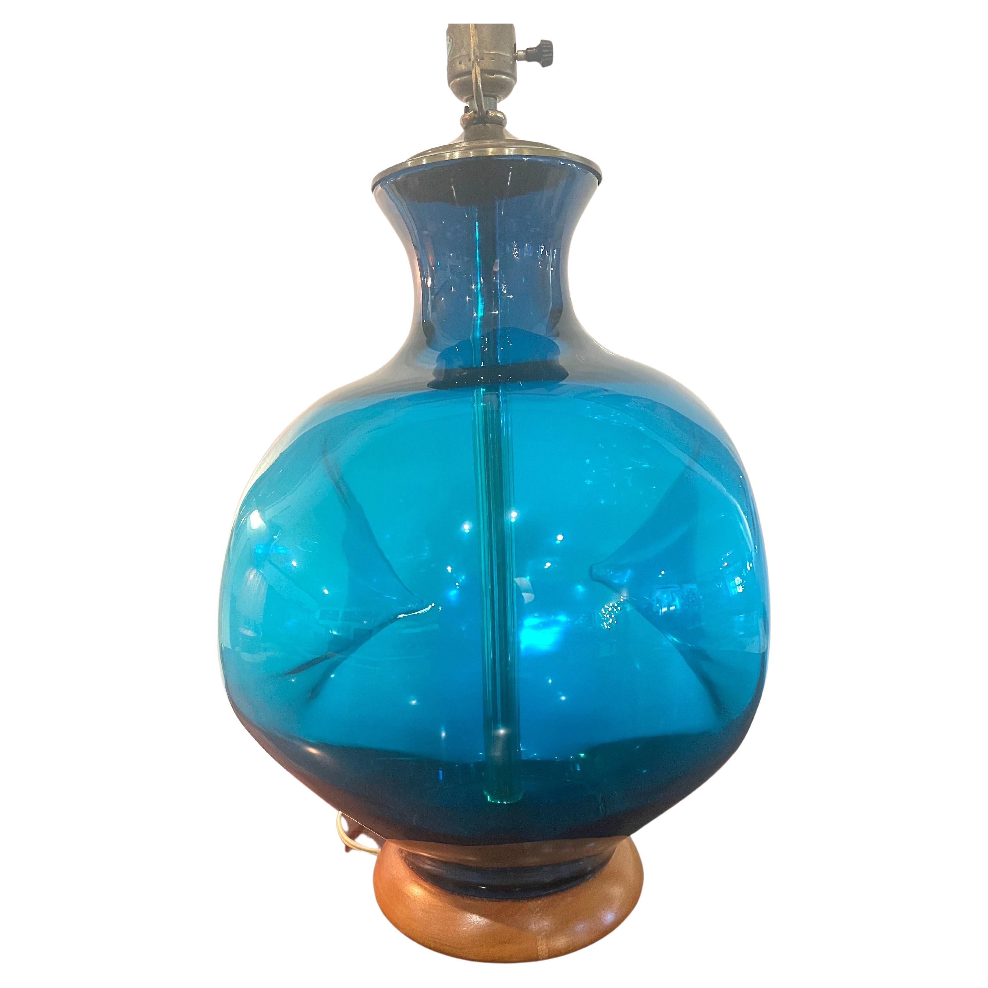 Winslow Andersen for Blenko rare blue glass mouth blown glass table lamp all original no chips or cracks, excellent condition, circa 1950's with solid maple base, beautiful unique striking color,