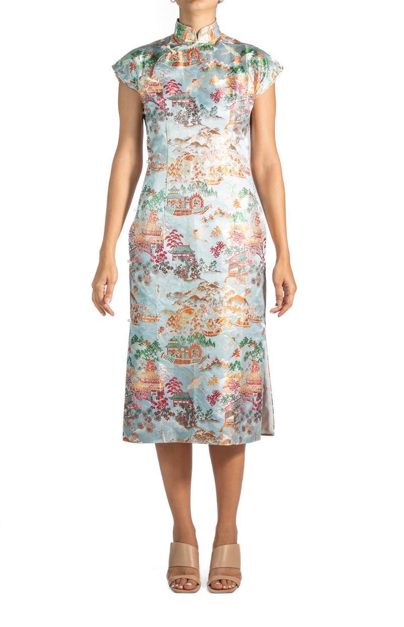 1950S Blue Multicolored Silk Brocade Qi Pao  Dress

MORPHEW VINTAGE represents the finest pieces of fashions past. Sourced from across the globe, dating as far back as a century. Each piece is selected with both quality and rarity in mind. Often