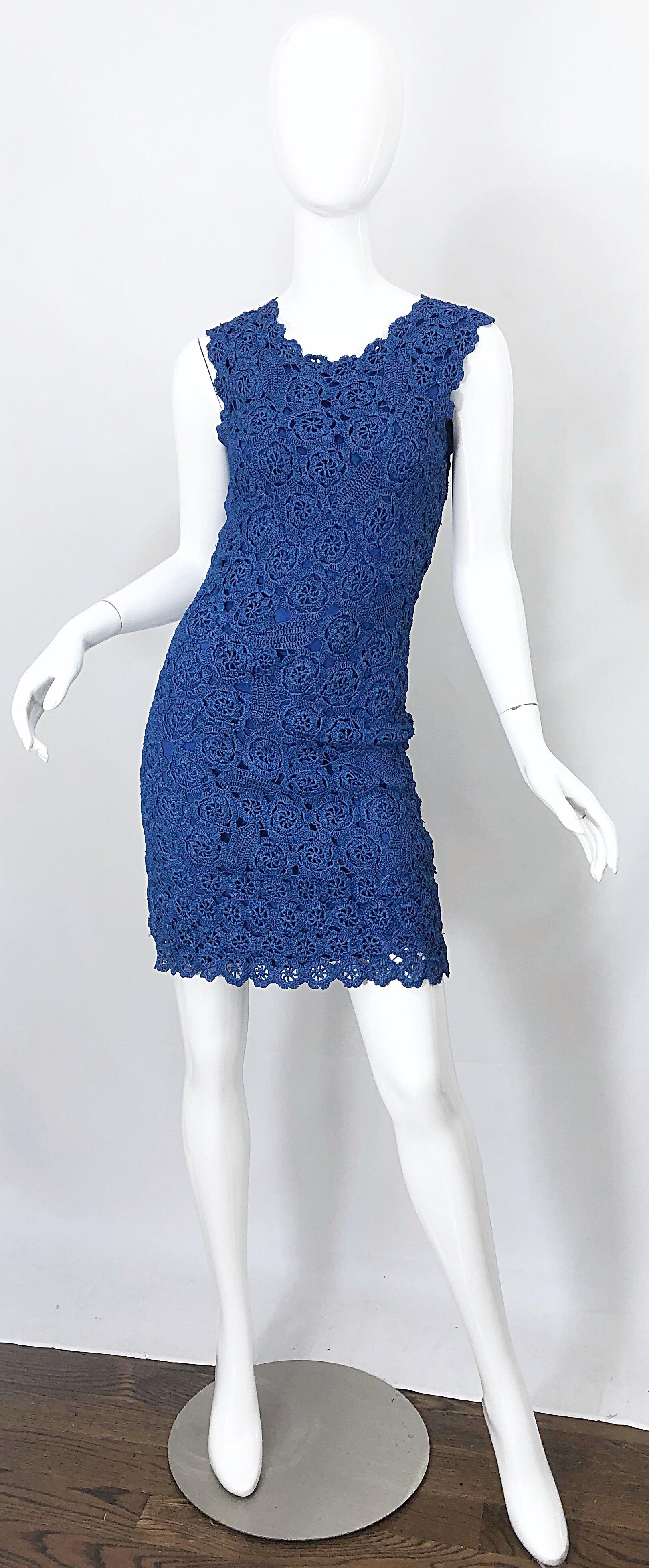 Beautiful vintage 1950s blue raffia demi couture wiggle dress! Features hand crochet work with raffia. Fully lined. Full metal zipper up the back with hook-and-eye closure. Can easily be dressed up or down. Expertly made, with heavy attention to