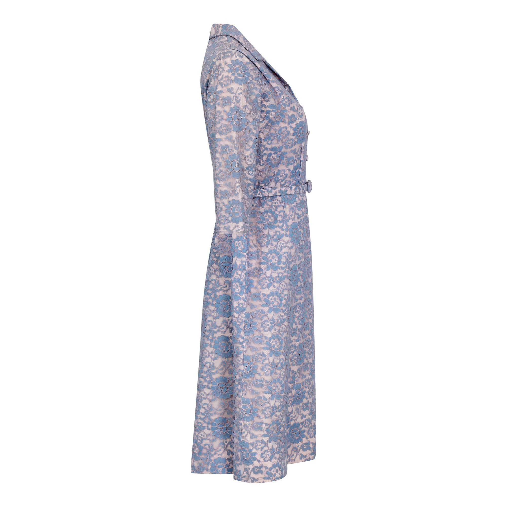 Original 1950s or early 1960s blush satin & floral mauve / blue lace belted tea dress.  The dress is a classic shirt-waister style with a shallow v-neck collar and a central fastening button stand featuring 4 fabric covered buttons. The dress