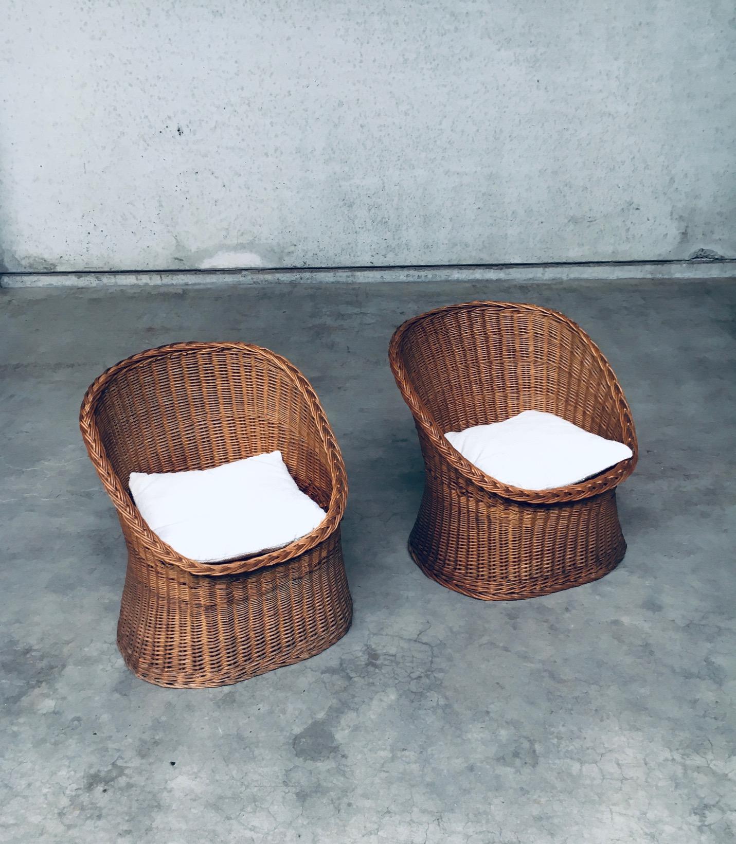 Vintage Boho Design Style Egg Basket Barrel Lounge Chair set of 2. Made in France, 1950's period. Rattan / Cane / Wicker woven handmade seats, with new bouclé cushion. These are handmade, which is clear in the slight difference in size. Beautiful in