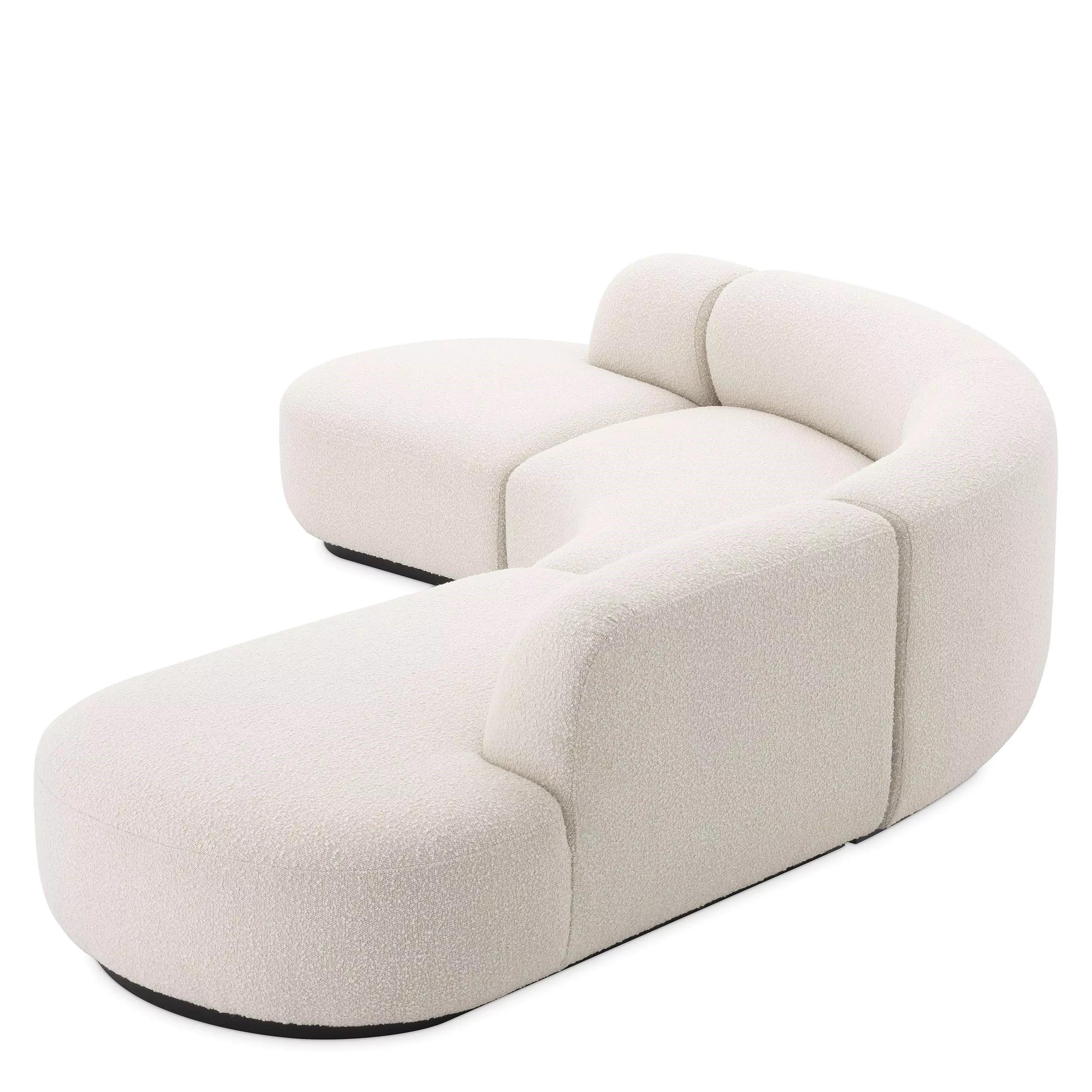 1950er Jahre Boomerang-Design Stil beige Bouclé-Stoff große geschwungene Sofa.
