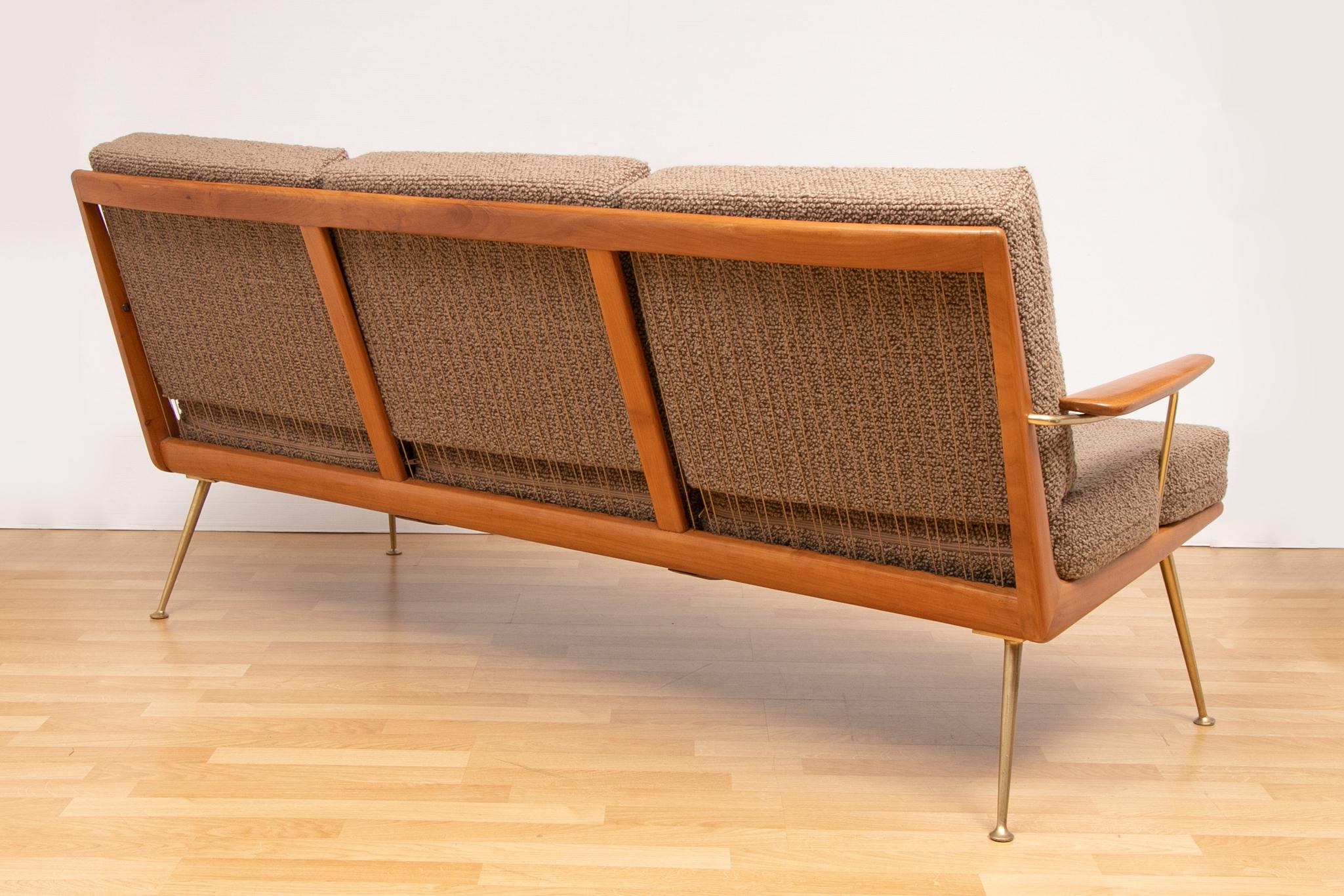 1950s Boomerang sofa designed by Hans Mitzlaff and Eugen Schmidt. Manufactured by Soloform/Eugen Schmidt in Germany. Designed in 1953 with a solid cherry wood frame. Restored and reupholstered in Bute fabric. In very good vintage condition with