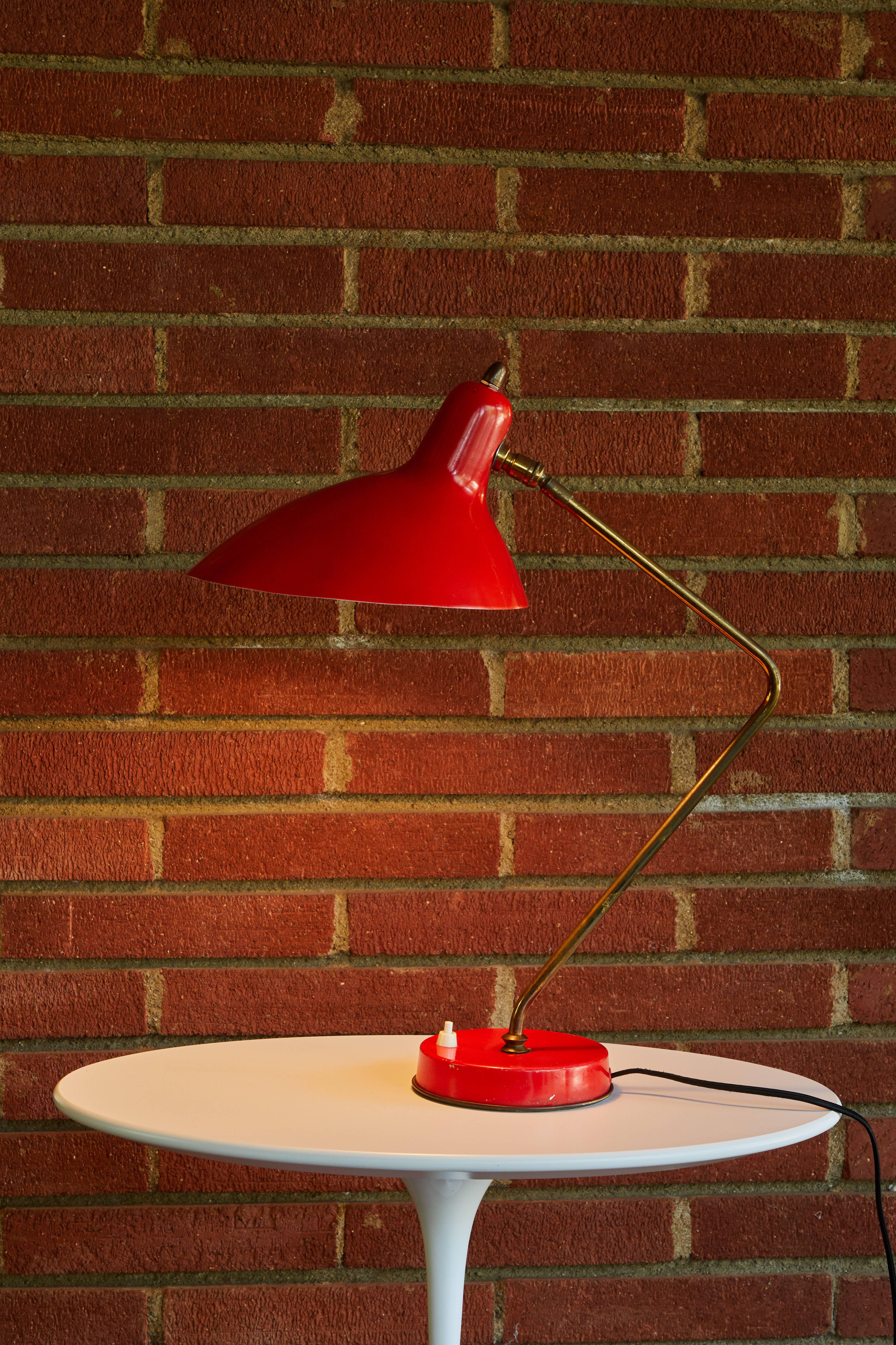 1950s Boris Lacroix table lamp. This rare and elegant table lamp is executed in red metal and brass, France, circa 1950s. A celebrated Art Deco lighting designer who successfully made the transition to Mid-Century Modern idiom, Jean Boris Lacroix's
