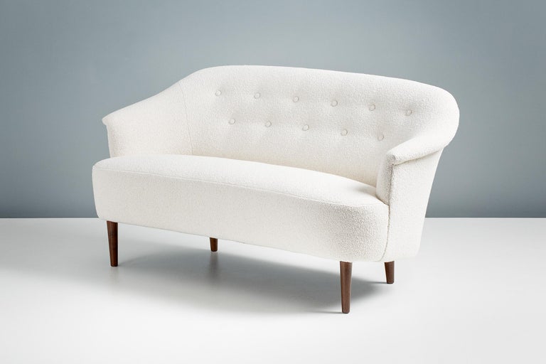 Carl Malmsten

Carl Malmsten Small Sofa, c1940s

This exceptional piece of Swedish furniture was designed in the 1940s by master cabinetmaker & designer Carl Malmsten. It was produced at his own workshop near Stockholm in Sweden. This example