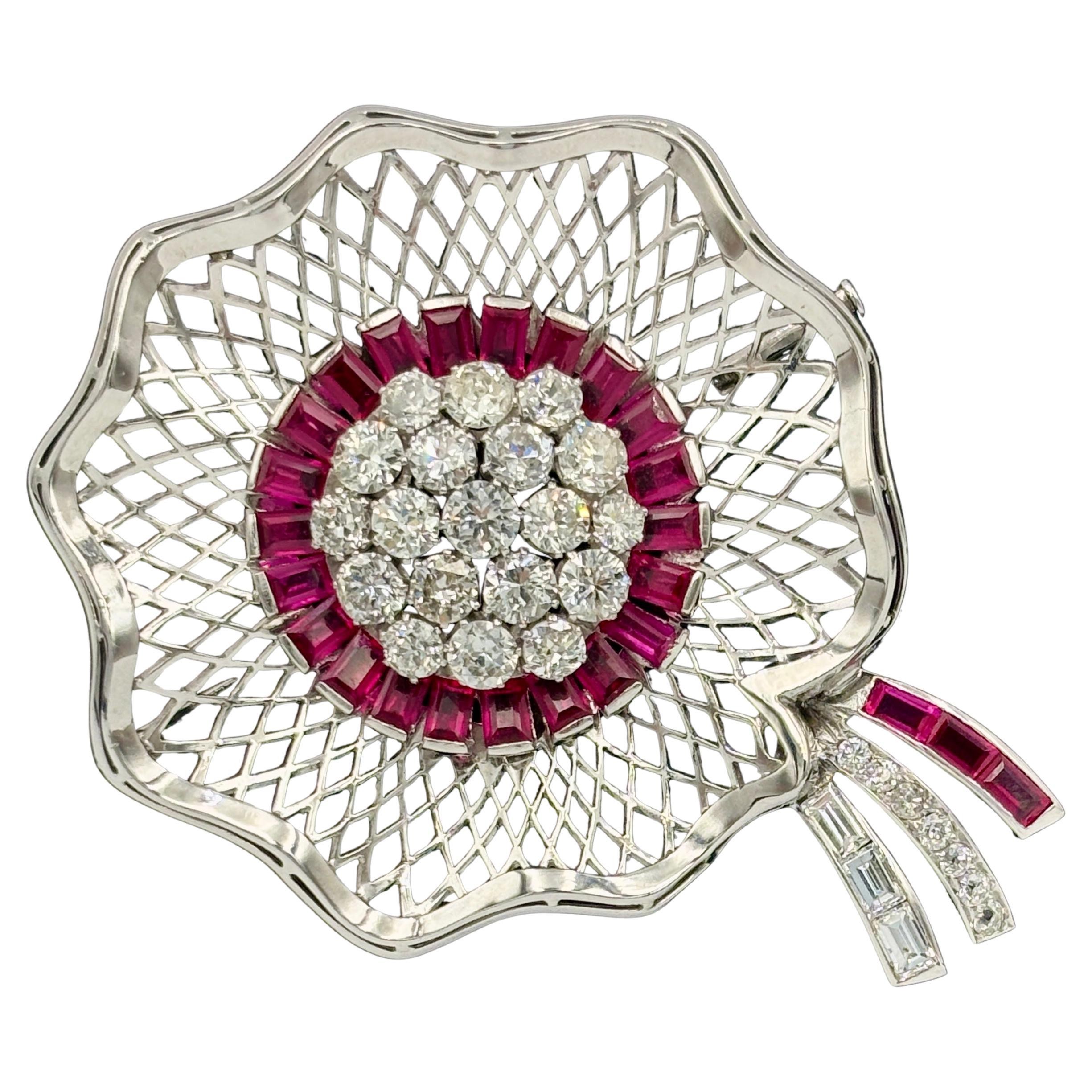 1950s bouquet brooch with approx 6c diamonds 
approx 2c rubies set in platinum