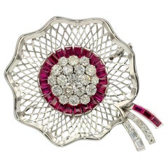 1950s bouquet brooch with approx 6c diamonds 
approx 2c rubies set in platinum