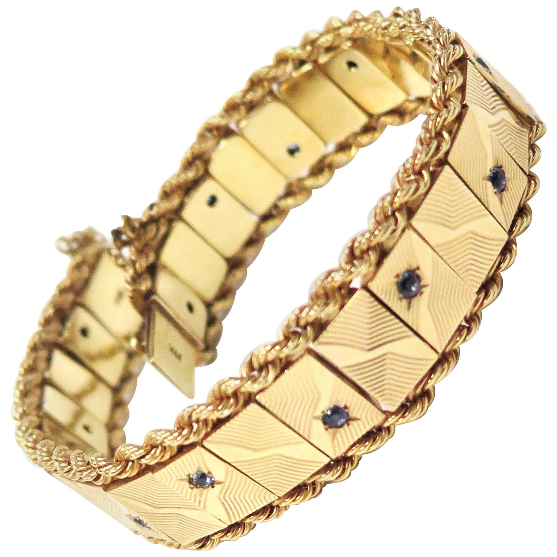 1950s Bracelet with Sapphires in Faceted Starbursts, 14 Karat Yellow Gold For Sale
