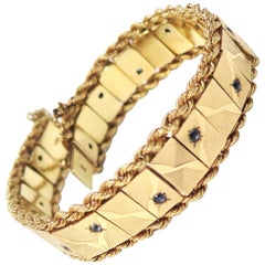 1950s Bracelet with Sapphires in Faceted Starbursts, 14 Karat Yellow Gold