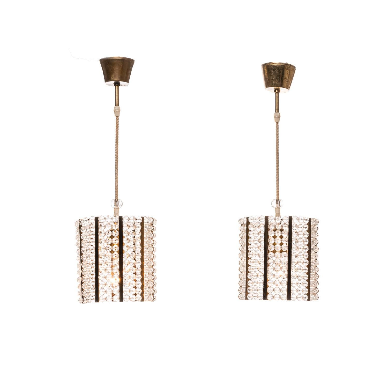 Every room deserves to be seen in its best light. These hanging lamps are the perfect way to do just that. The acrylic beading and contrasting brass elements add an air of opulence to the beautiful lights. They have a presence in any room, measuring