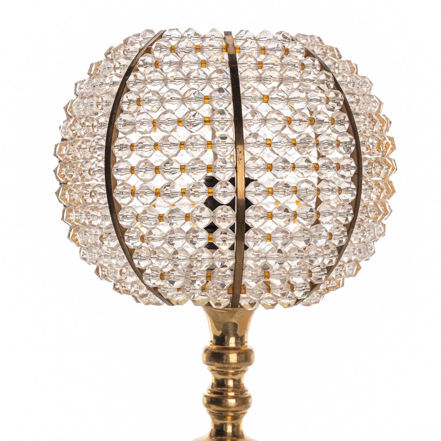 The acrylic beading and contrasting brass elements add an air of opulence to these beautiful lights. We have more lights of the same style in stock. Also in different shapes and sizes.