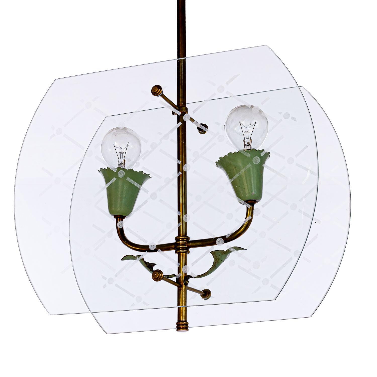 Sleek two light lantern in style of Fontana Arte. Consists of two etched glass panels with a line & ball pattern, a brass frame and green colored lamp E14 socket.