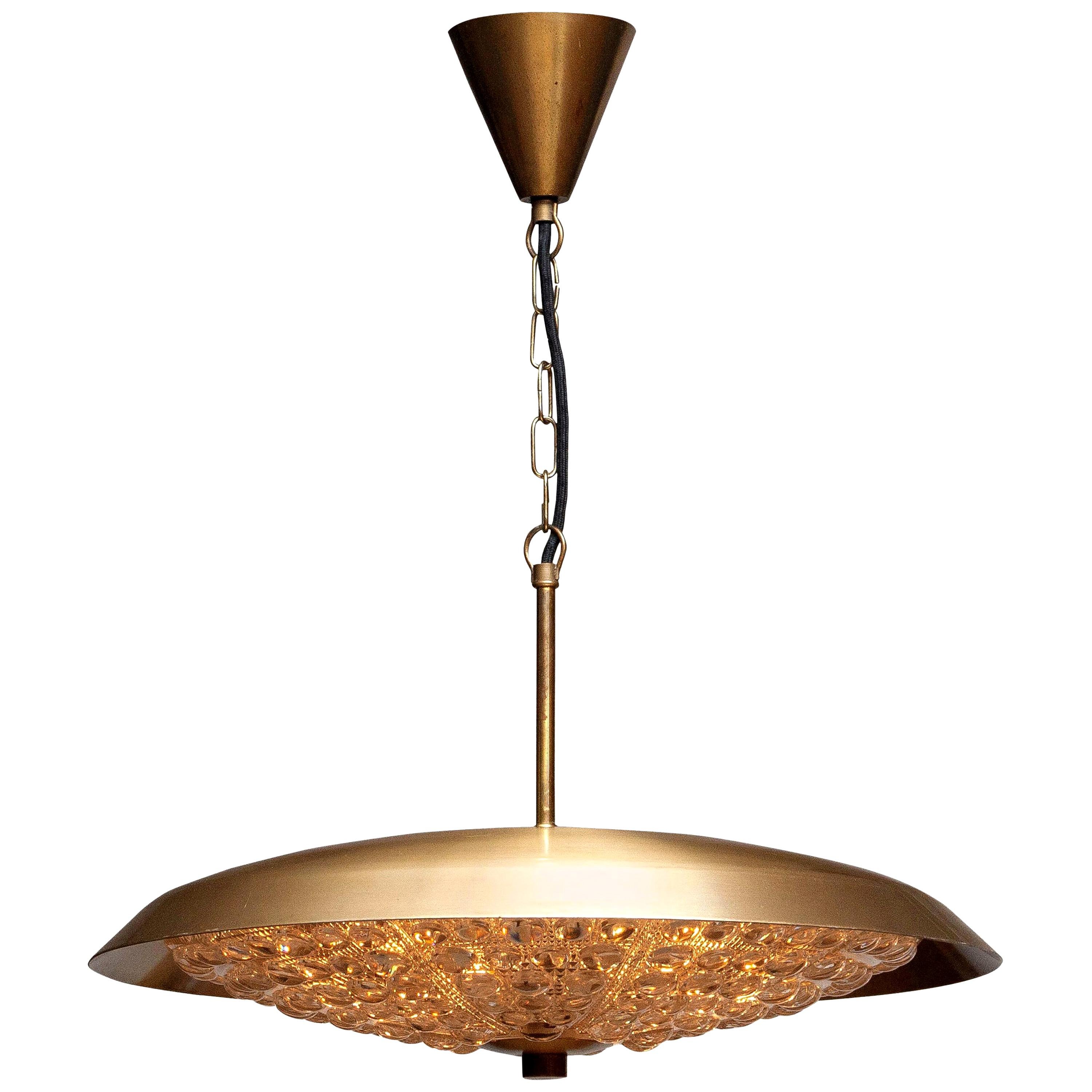 Mid-Century Modern 1950s, Brass and Glass Pendant Lamp Designed by Carl Fagerlund for Orrefors